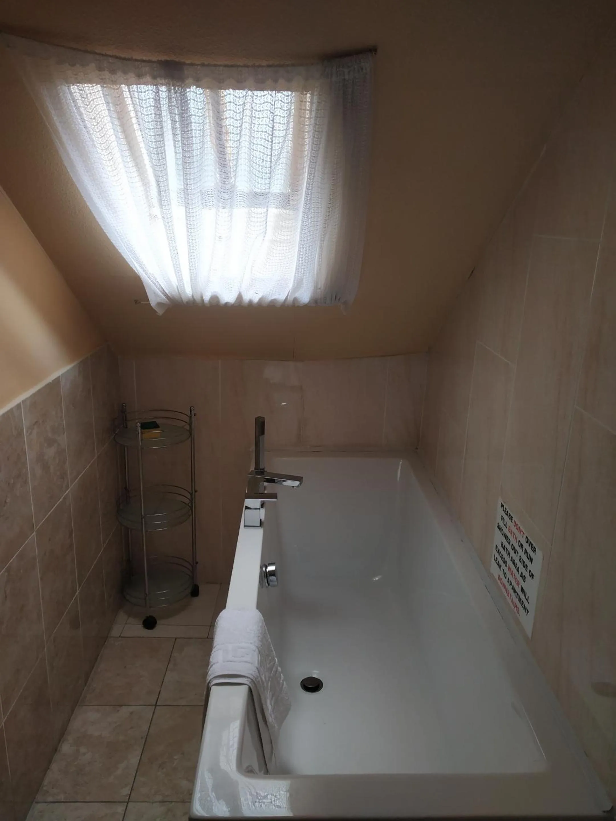 Bathroom in Busby Apartments