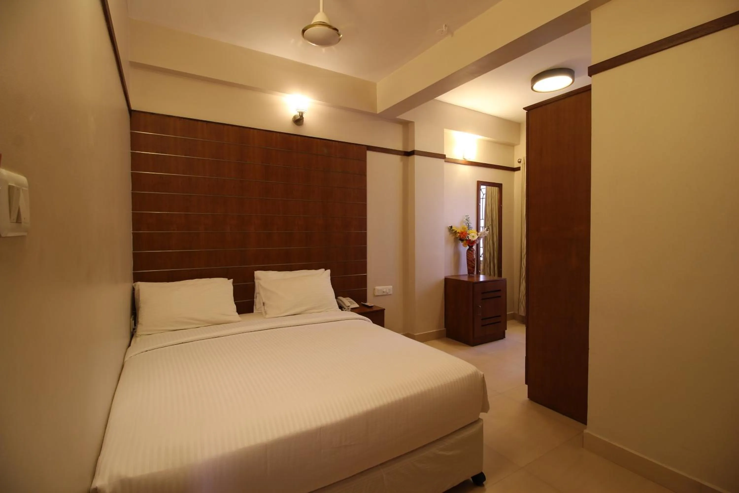 Photo of the whole room, Bed in Srivar Hotels