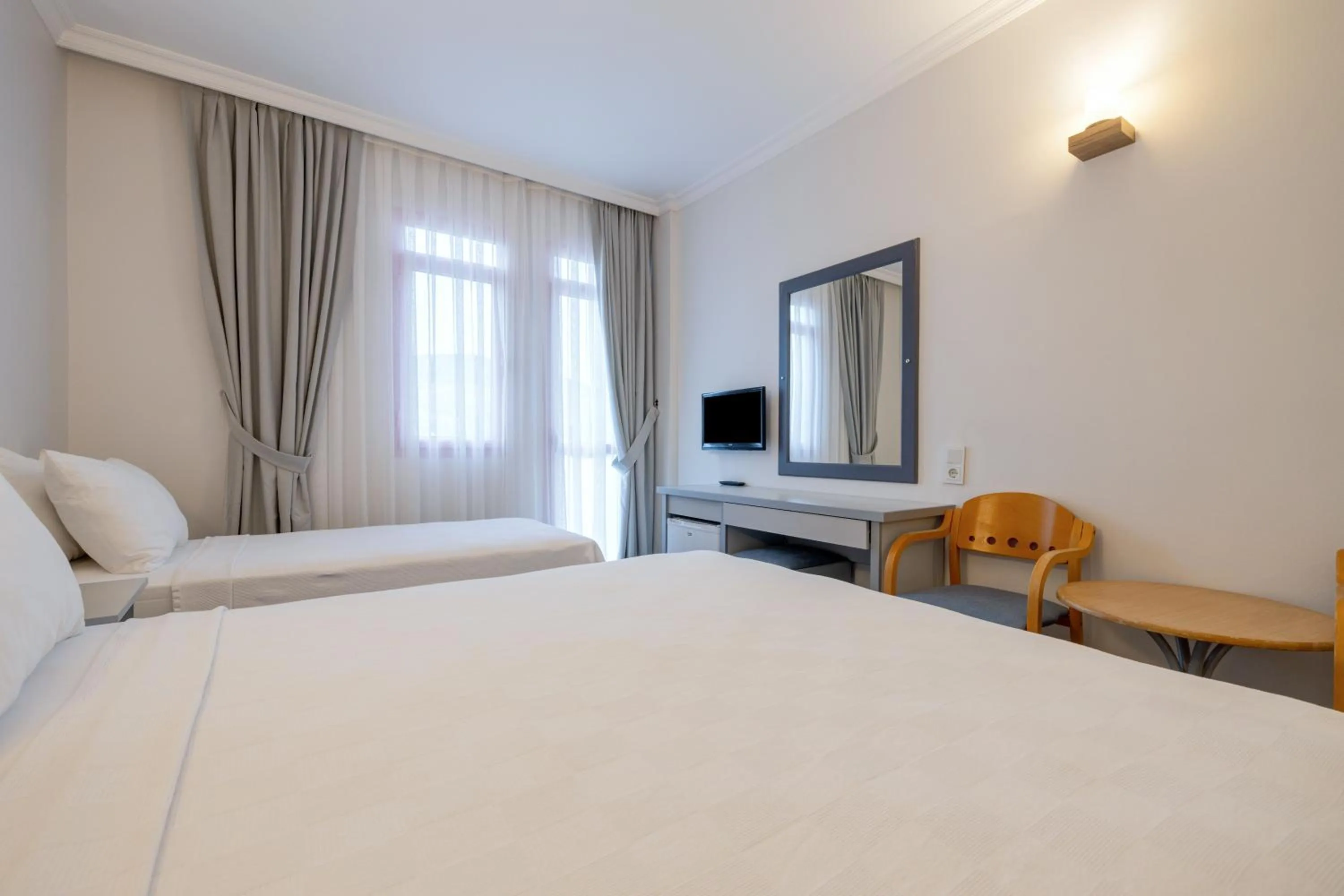 Bed in Hanedan Beach Hotel