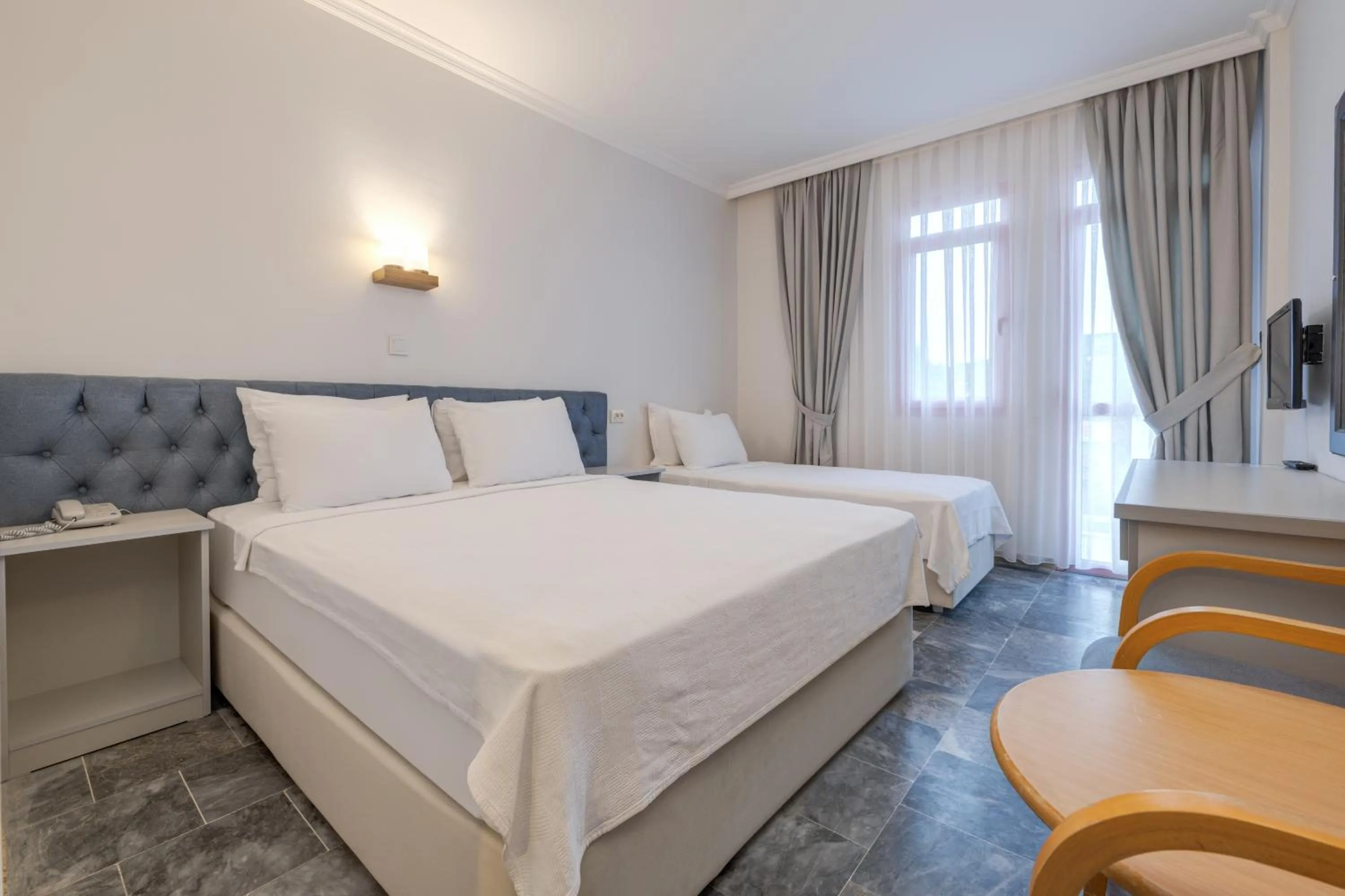 Bed in Hanedan Beach Hotel