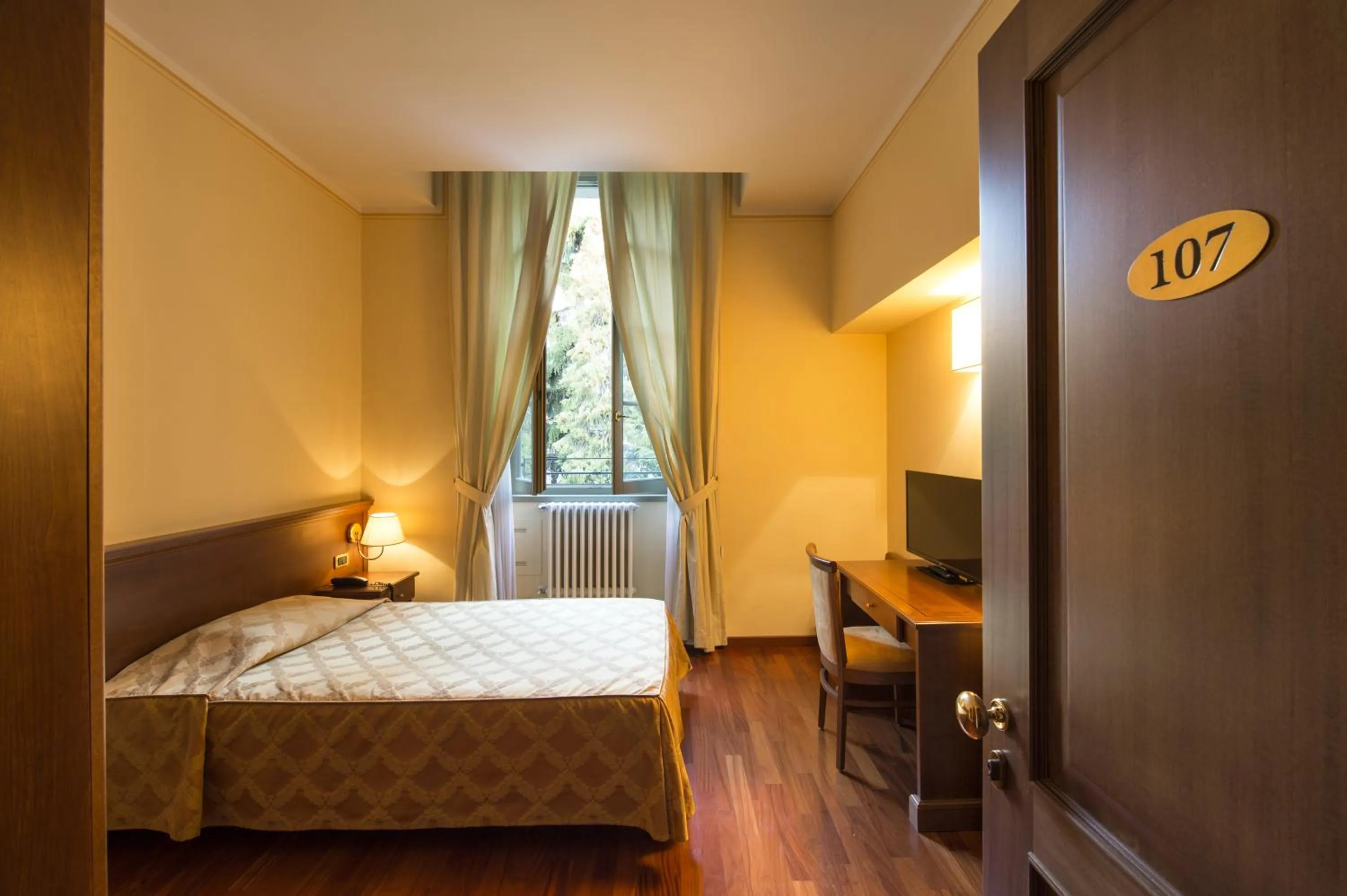 Photo of the whole room, Bed in Centro Paolo VI
