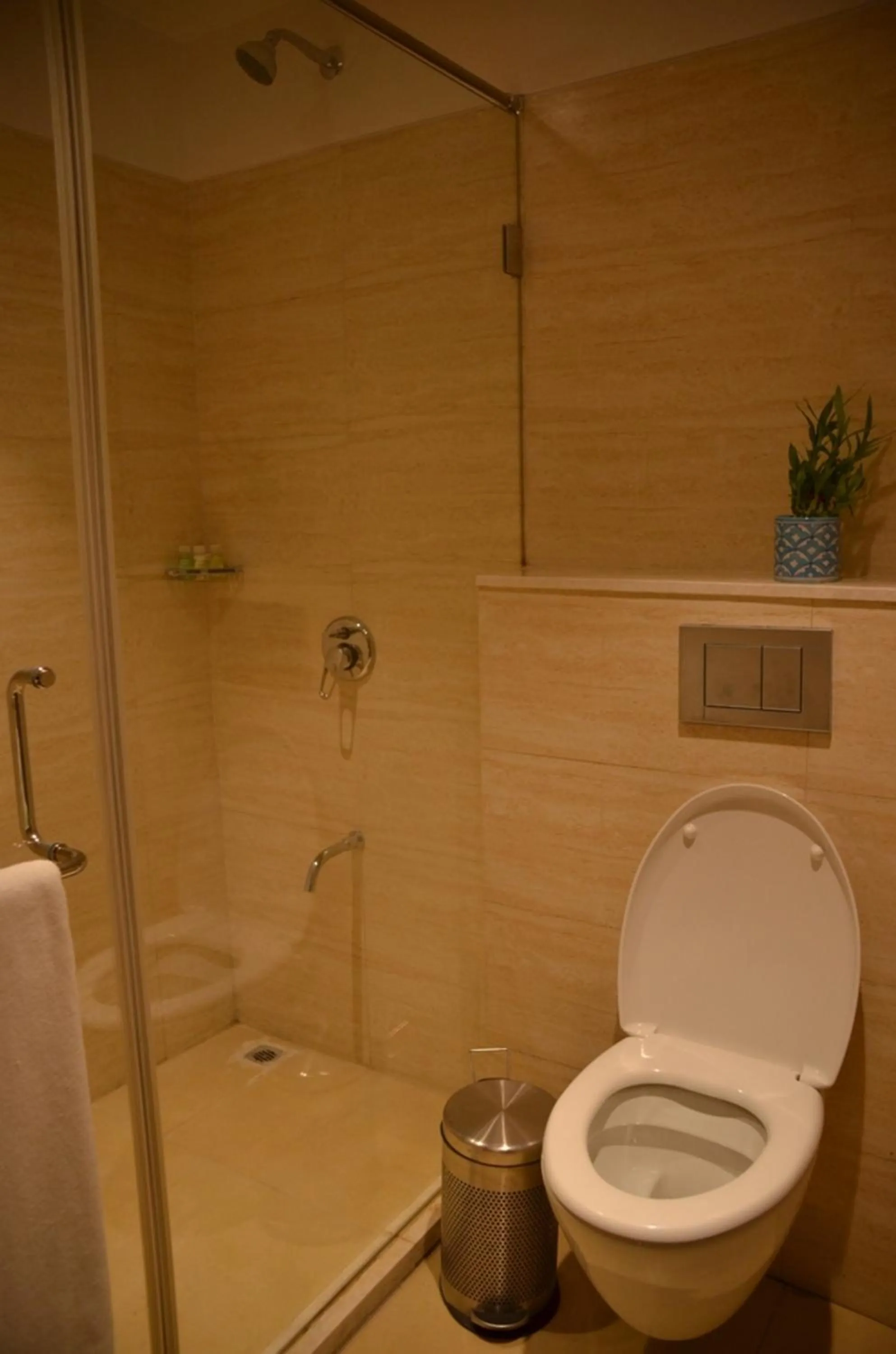 Bathroom in The Lalit Traveller- Airport hotel
