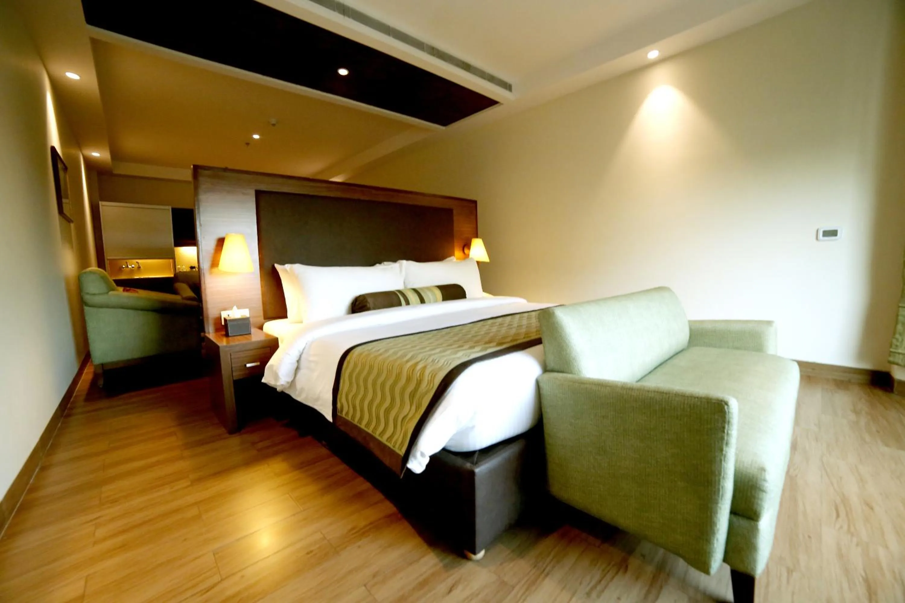 Photo of the whole room, Bed in The Lalit Traveller- Airport hotel