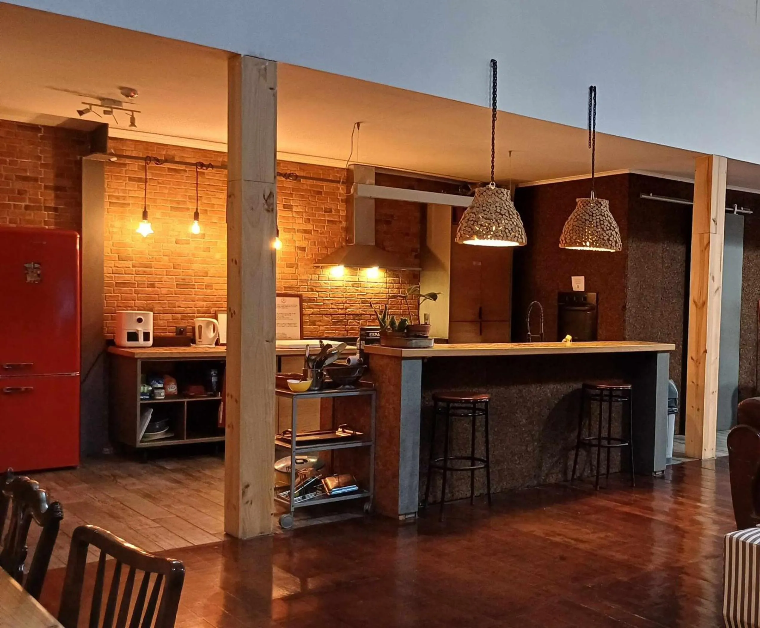 Kitchen or kitchenette in Caruma Surf Hostel