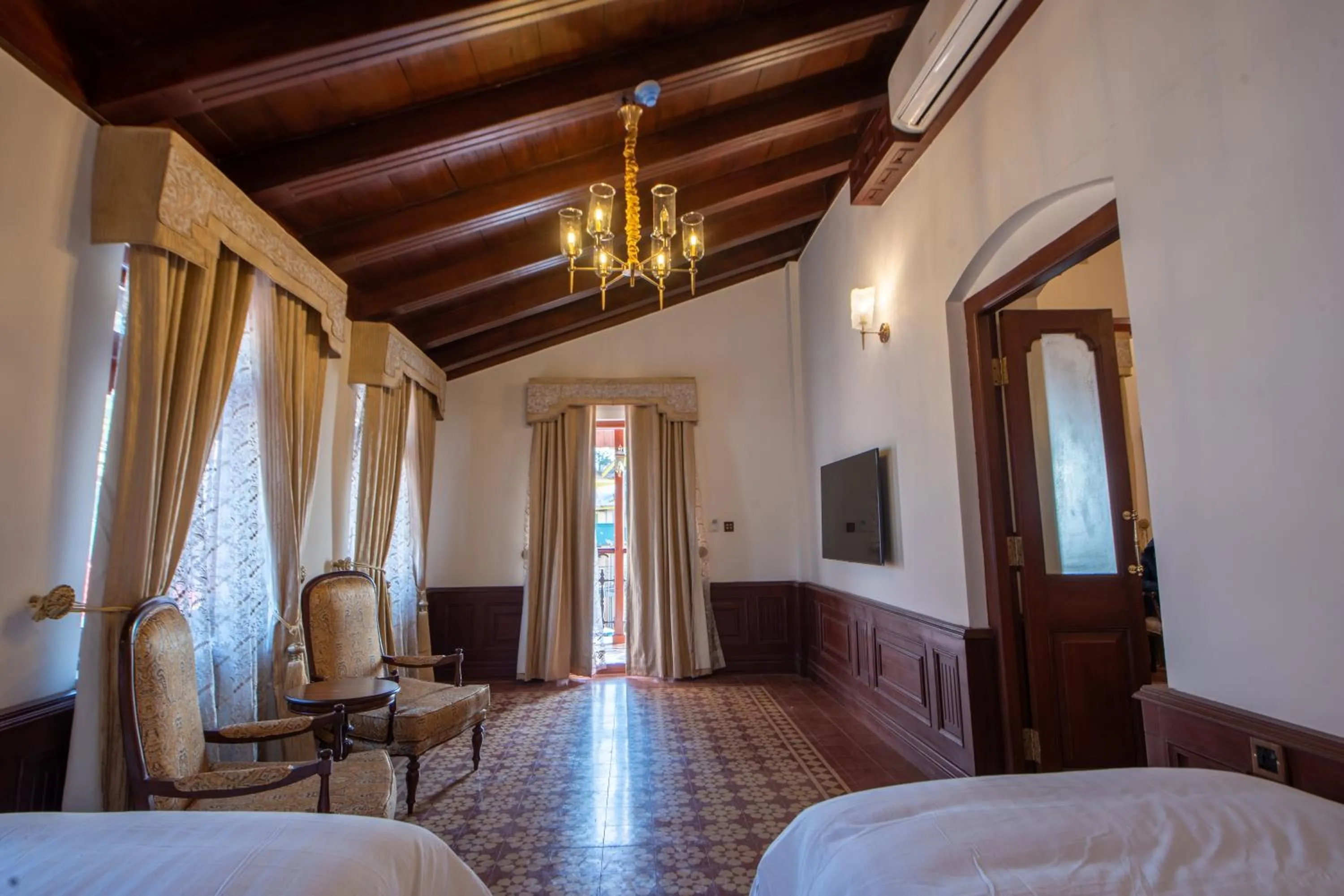 Seating area, Bed in Cecil by Pearl Continental