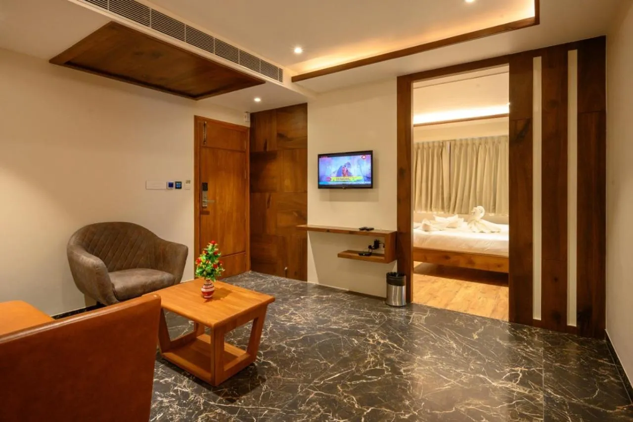 Living room, Bed in Chithara Comforts