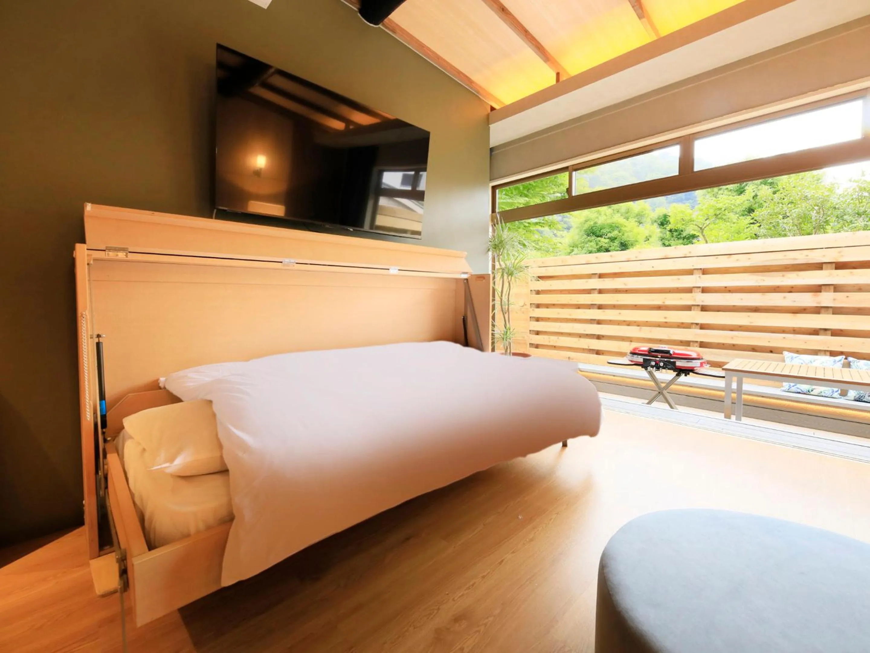 Bed in SPRINGS VILLAGE 足柄 丹沢温泉リゾート＆グランピング