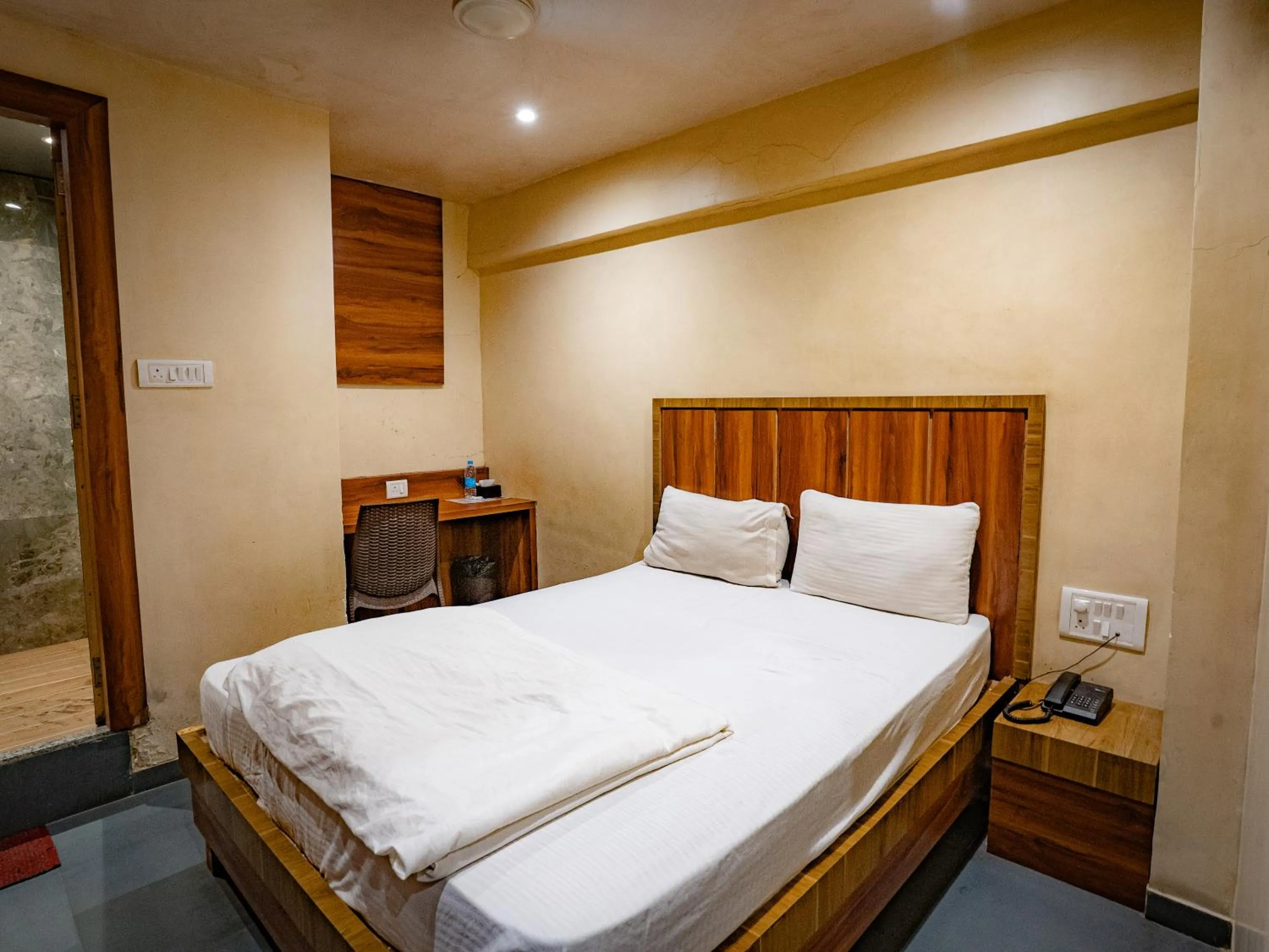 Bed in Hotel Mourya Residency