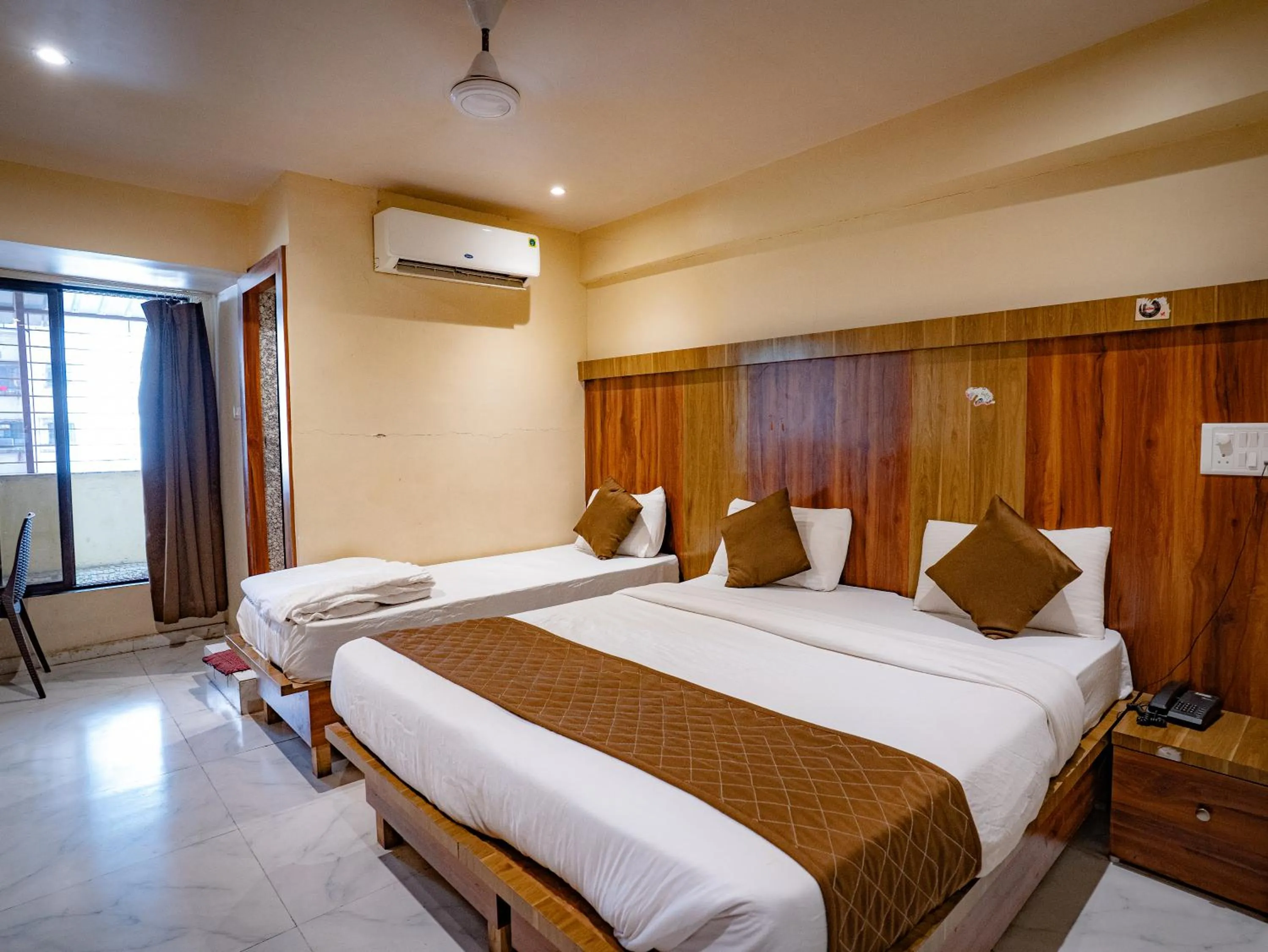 Bed in Hotel Mourya Residency