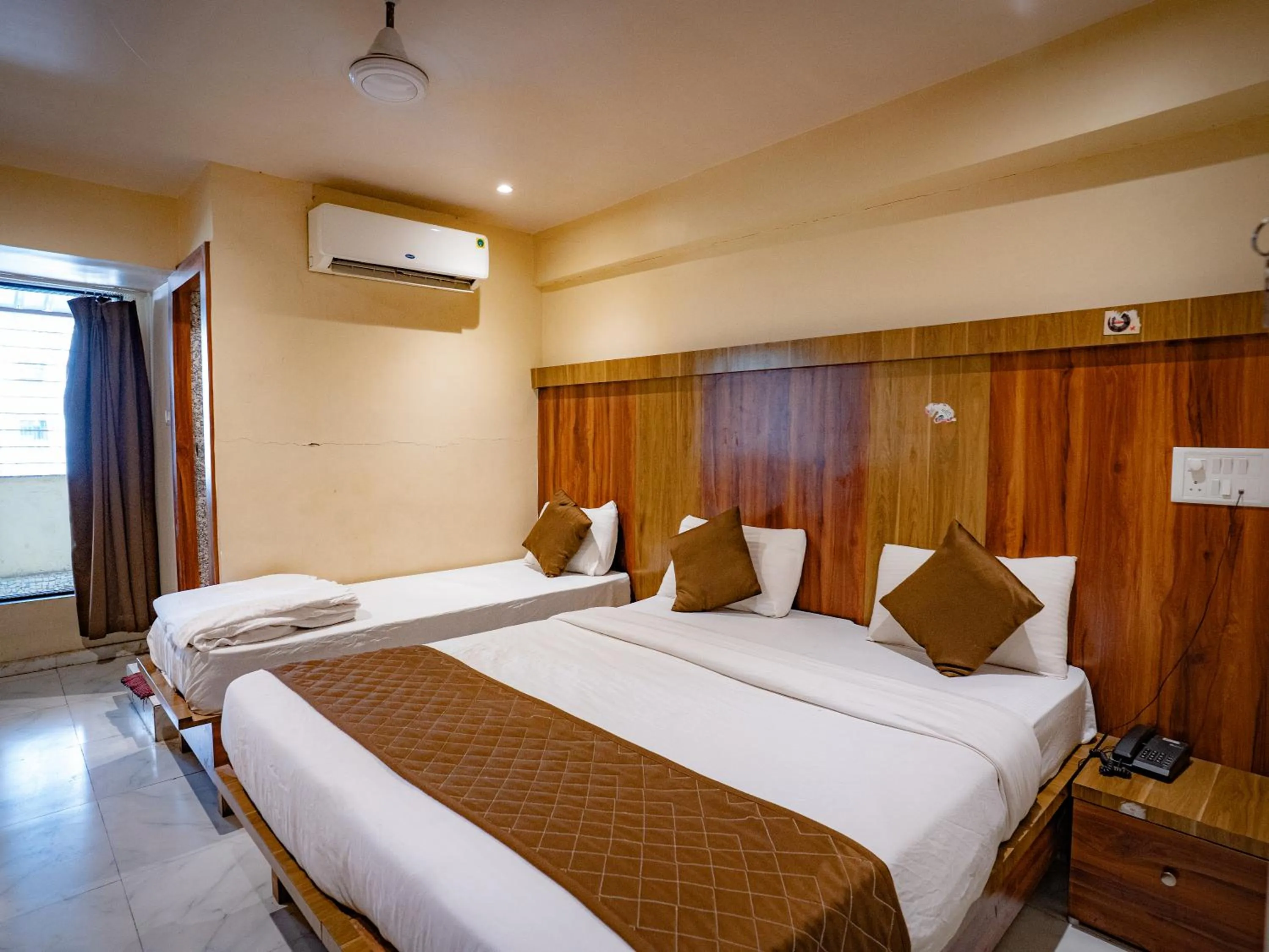 Bed in Hotel Mourya Residency