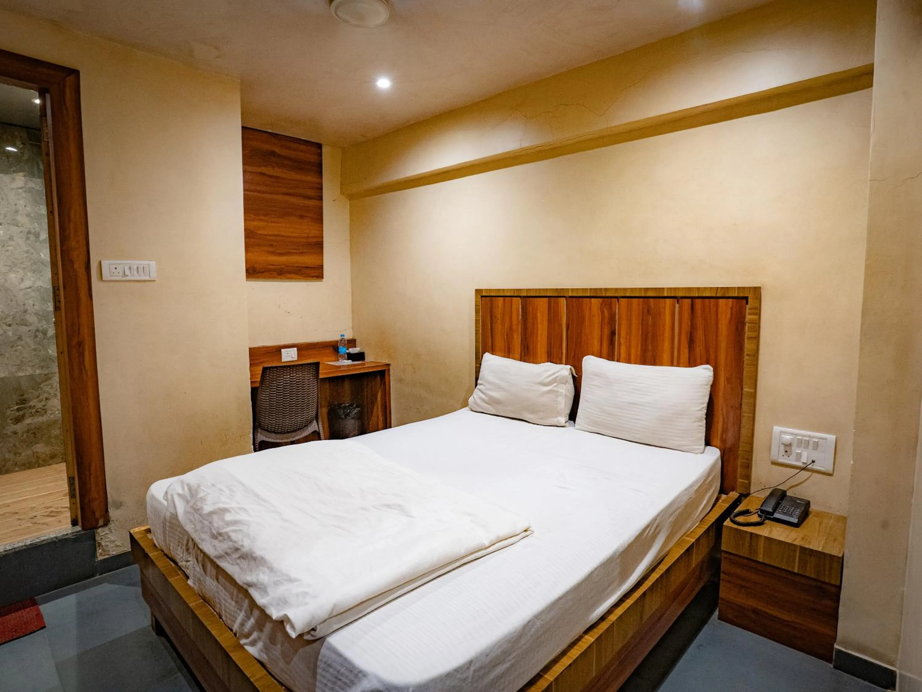 Bed in Hotel Mourya Residency