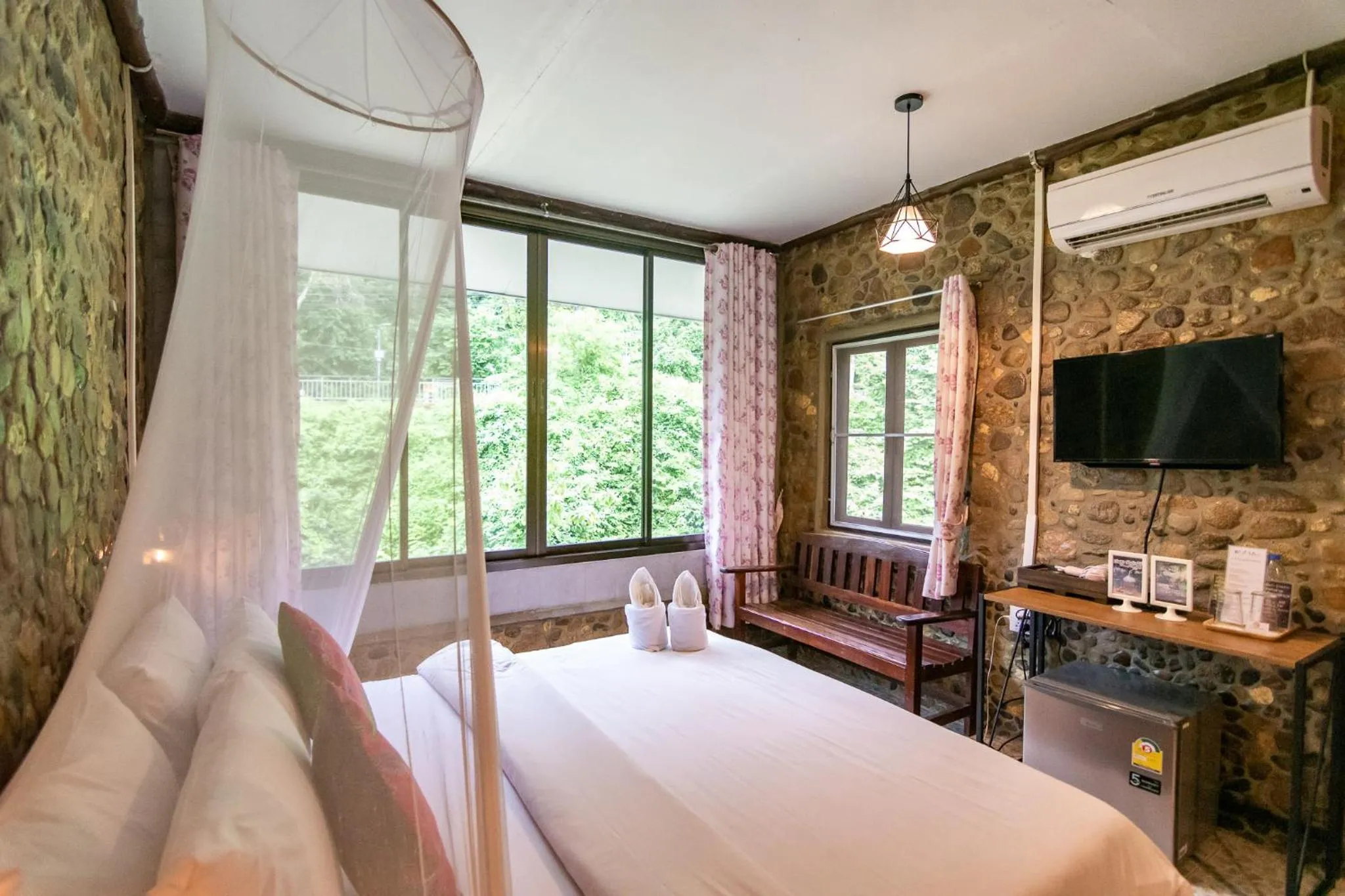 Bed in THANSILA Resort