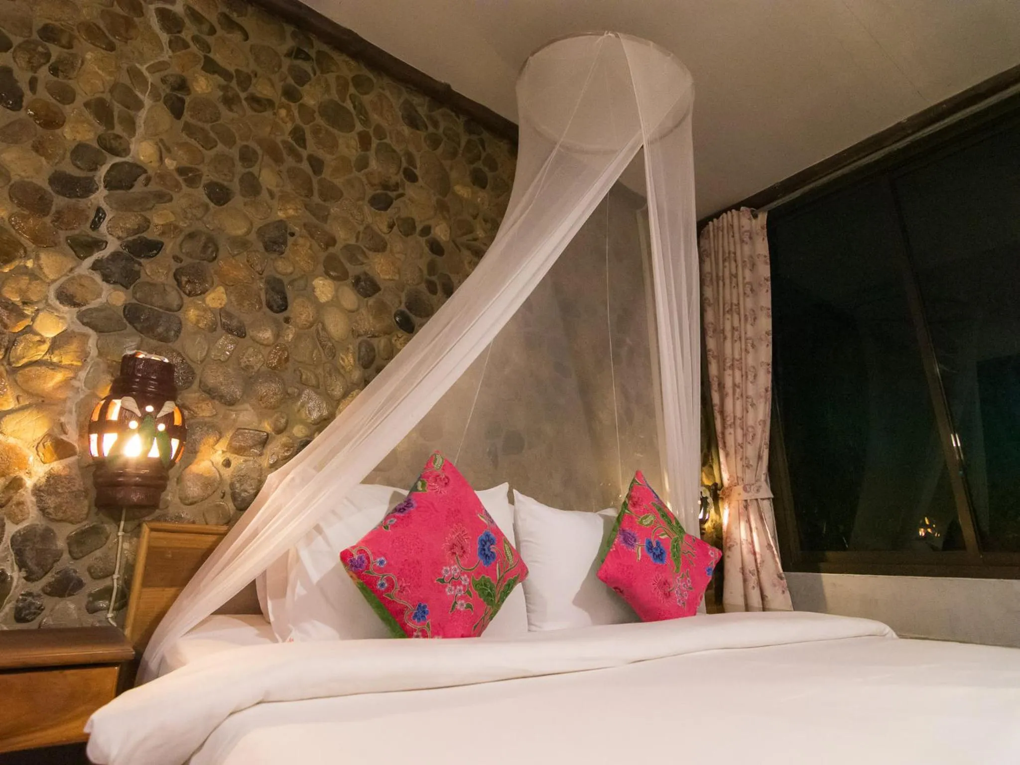 Bed in THANSILA Resort