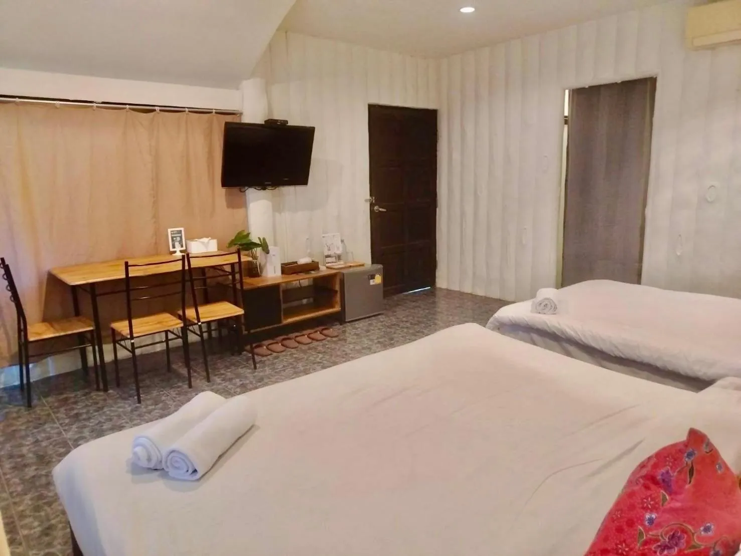 Bed in THANSILA Resort