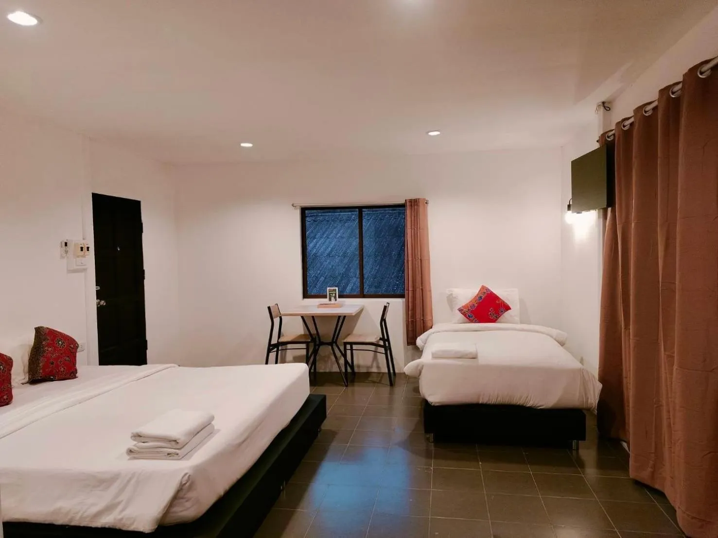 Bed in THANSILA Resort