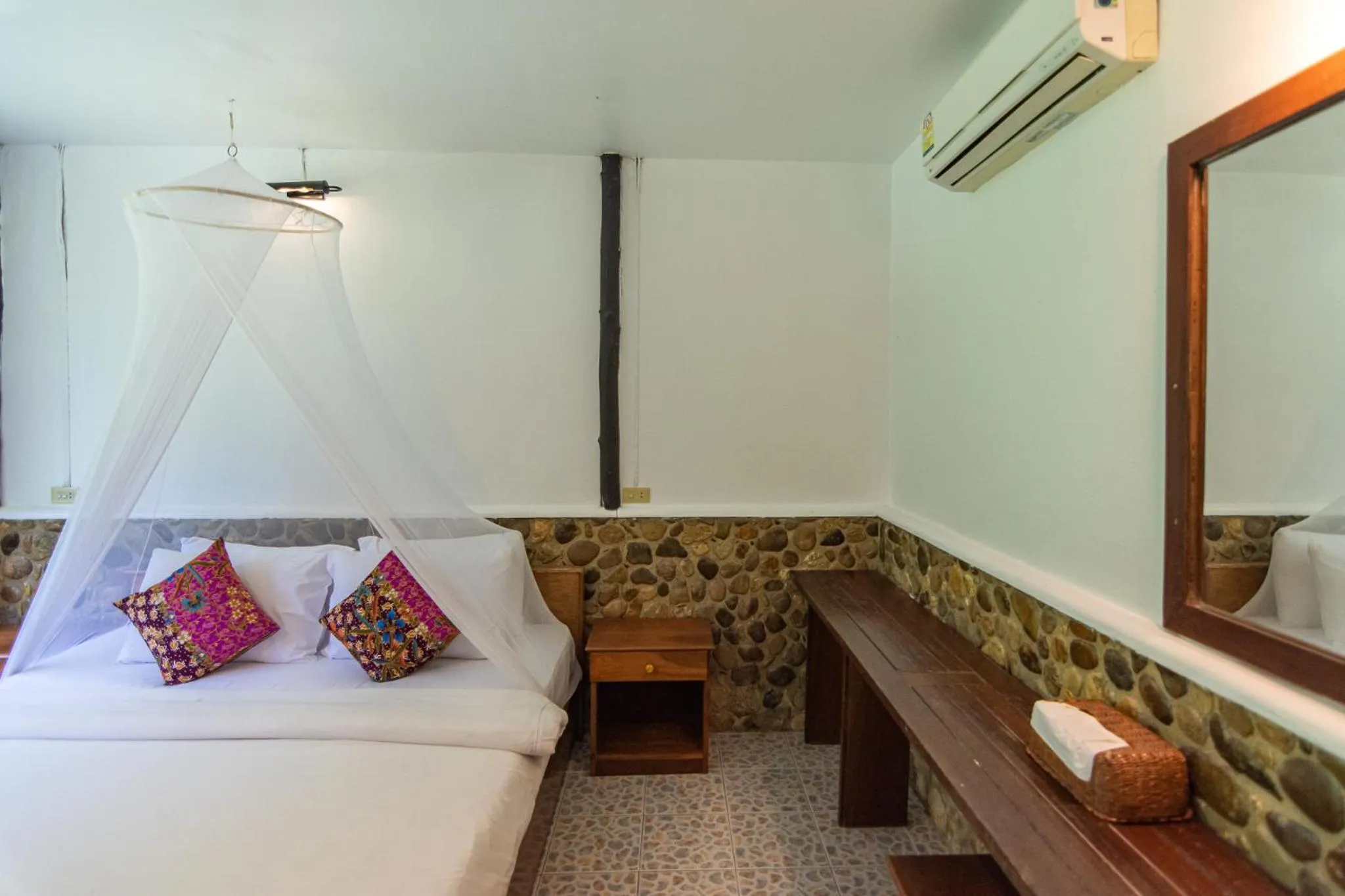 Bed in THANSILA Resort