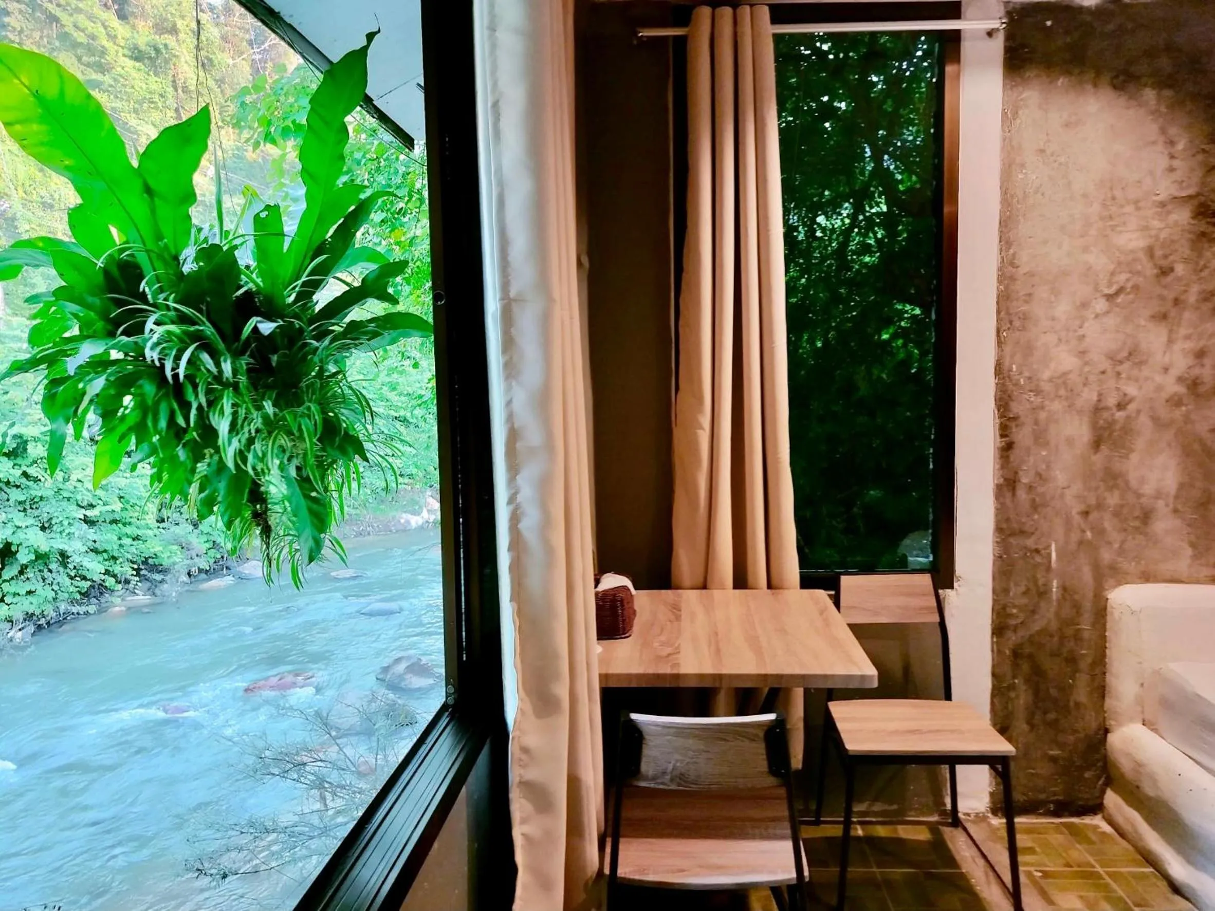 Seating area in THANSILA Resort