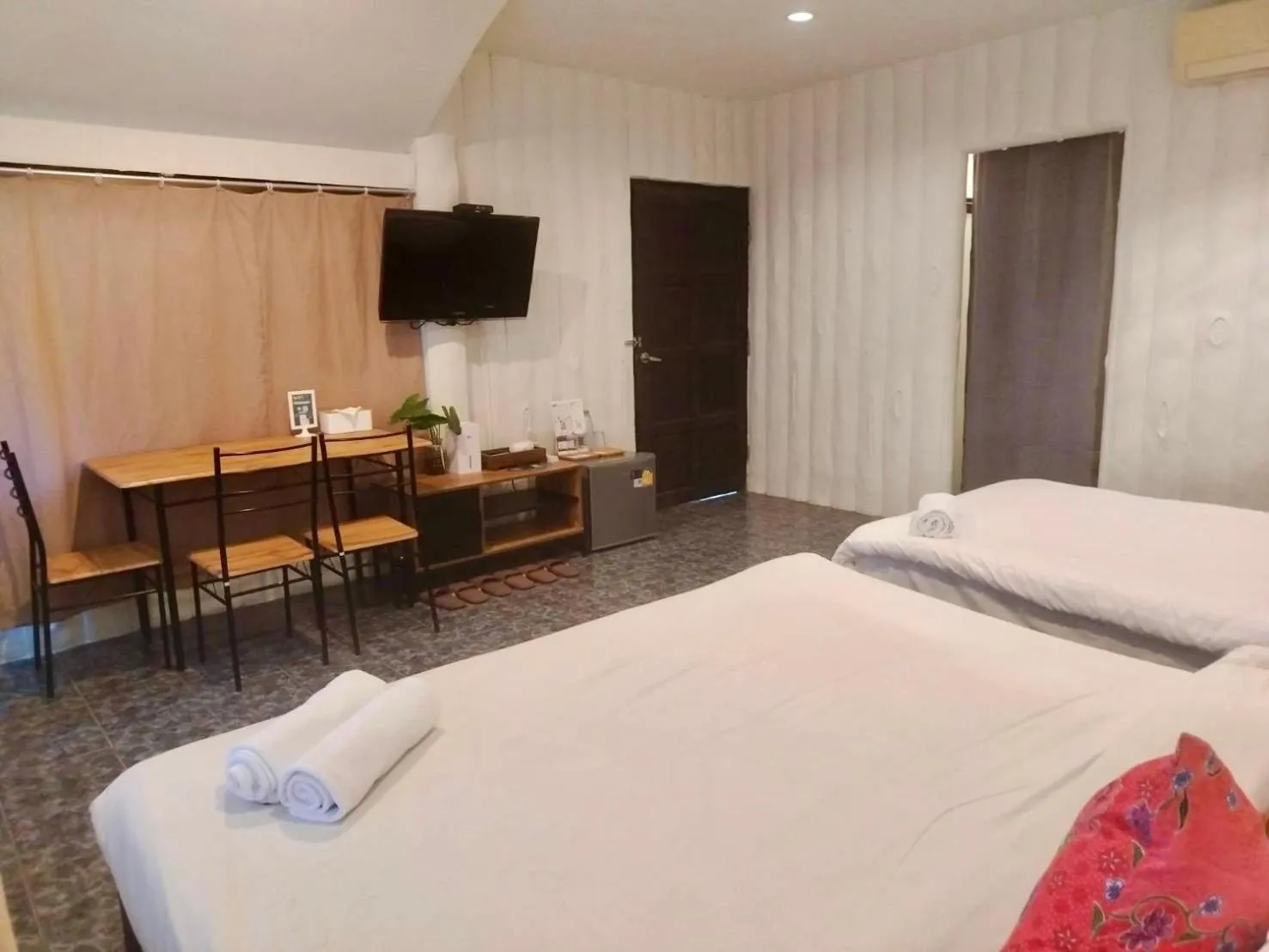 Bed in THANSILA Resort