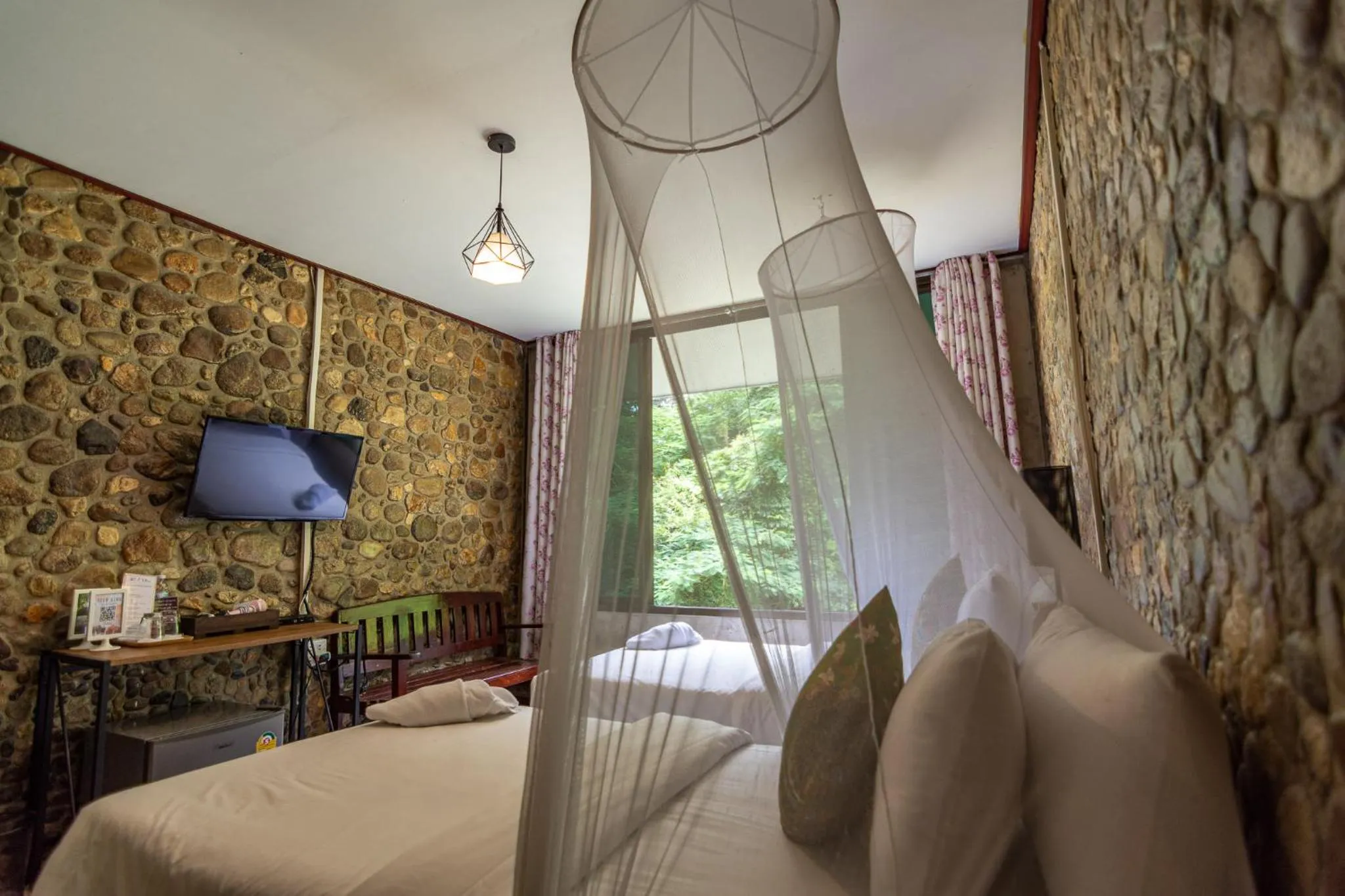 Bed in THANSILA Resort