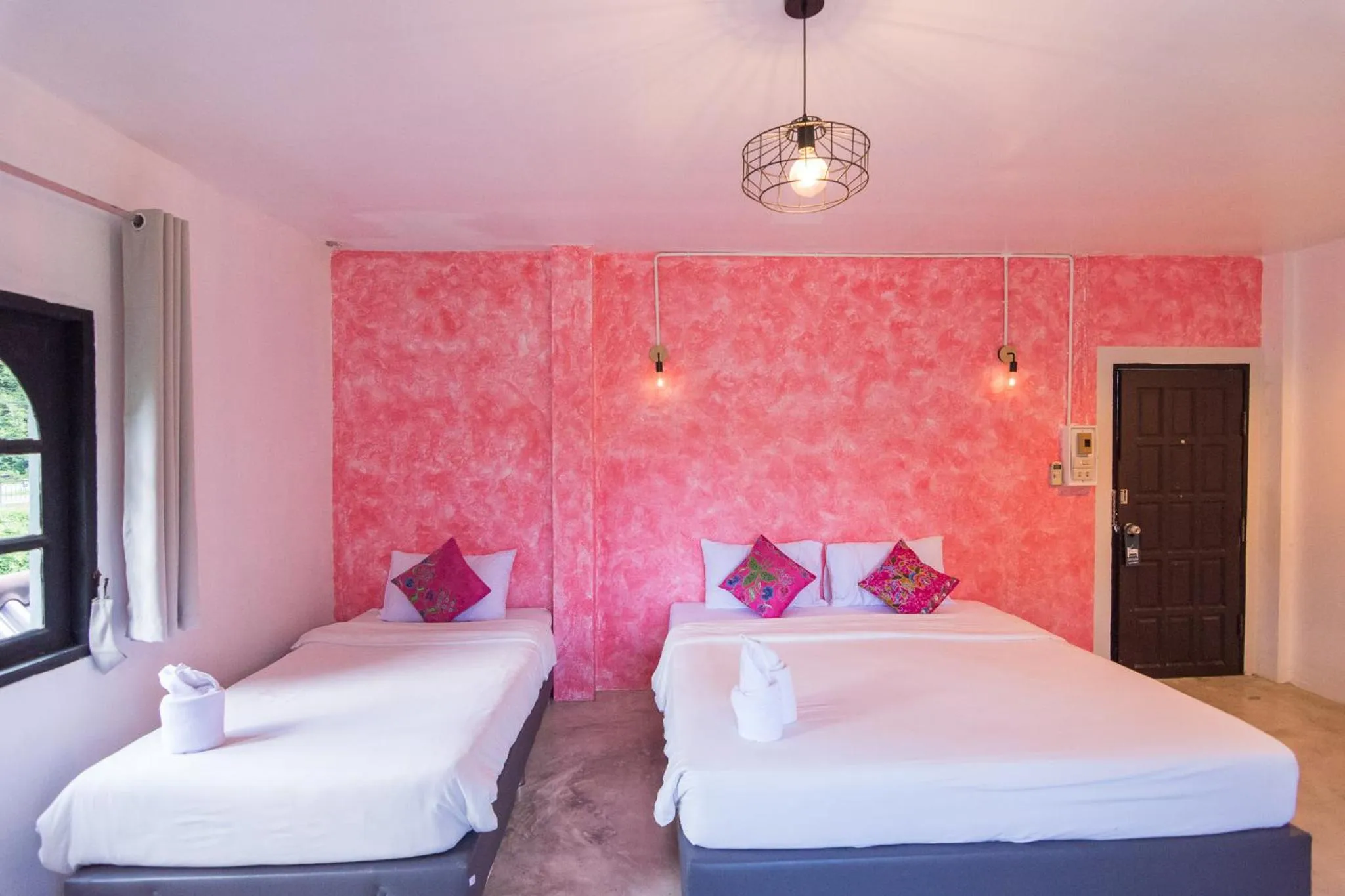 Bed in THANSILA Resort