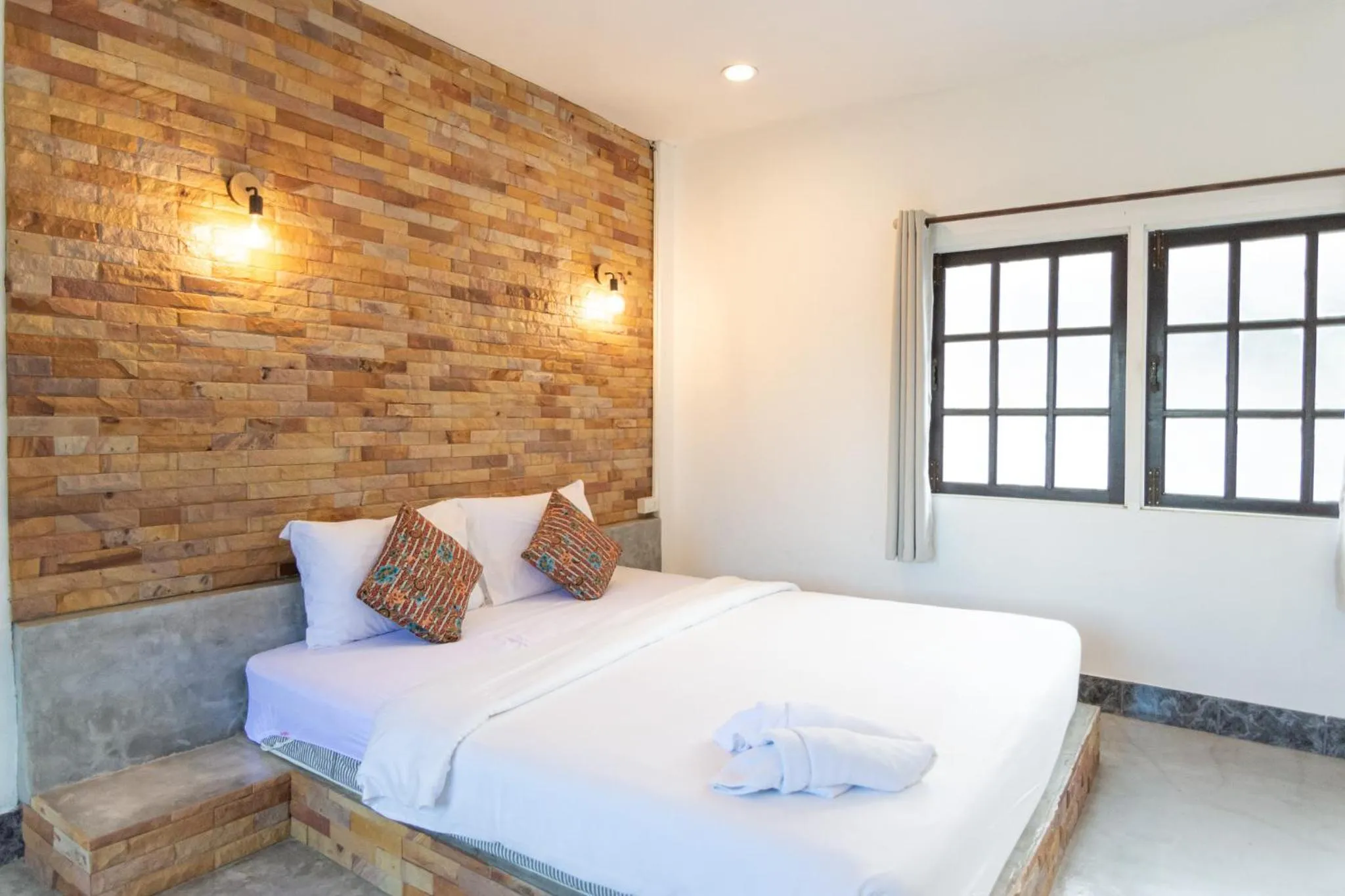 Bed in THANSILA Resort