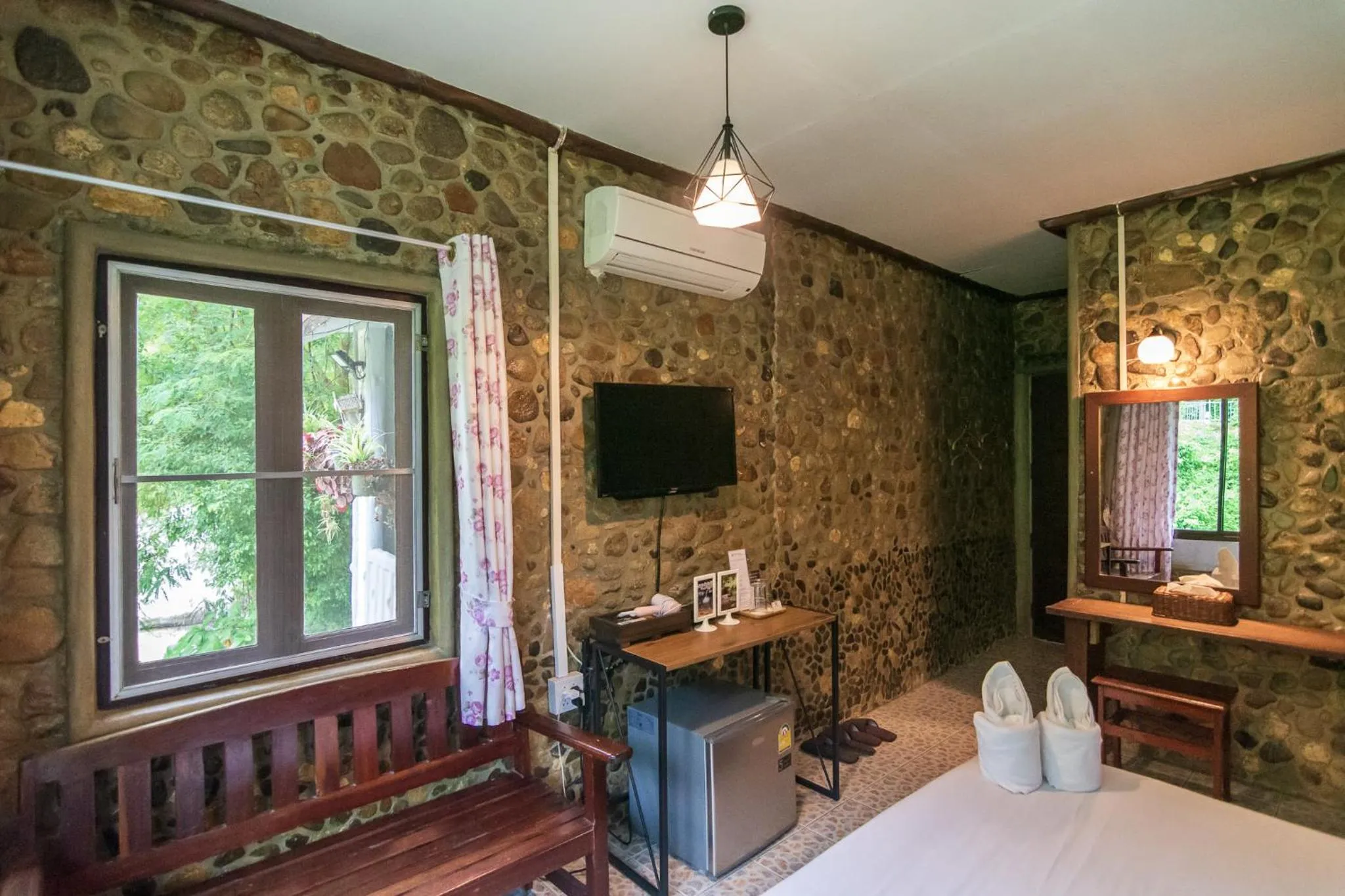 Bed in THANSILA Resort