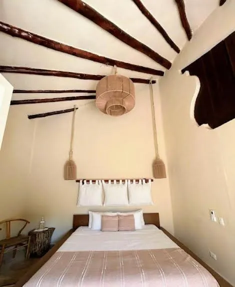 Bed in Alquimia Hotel Boutique