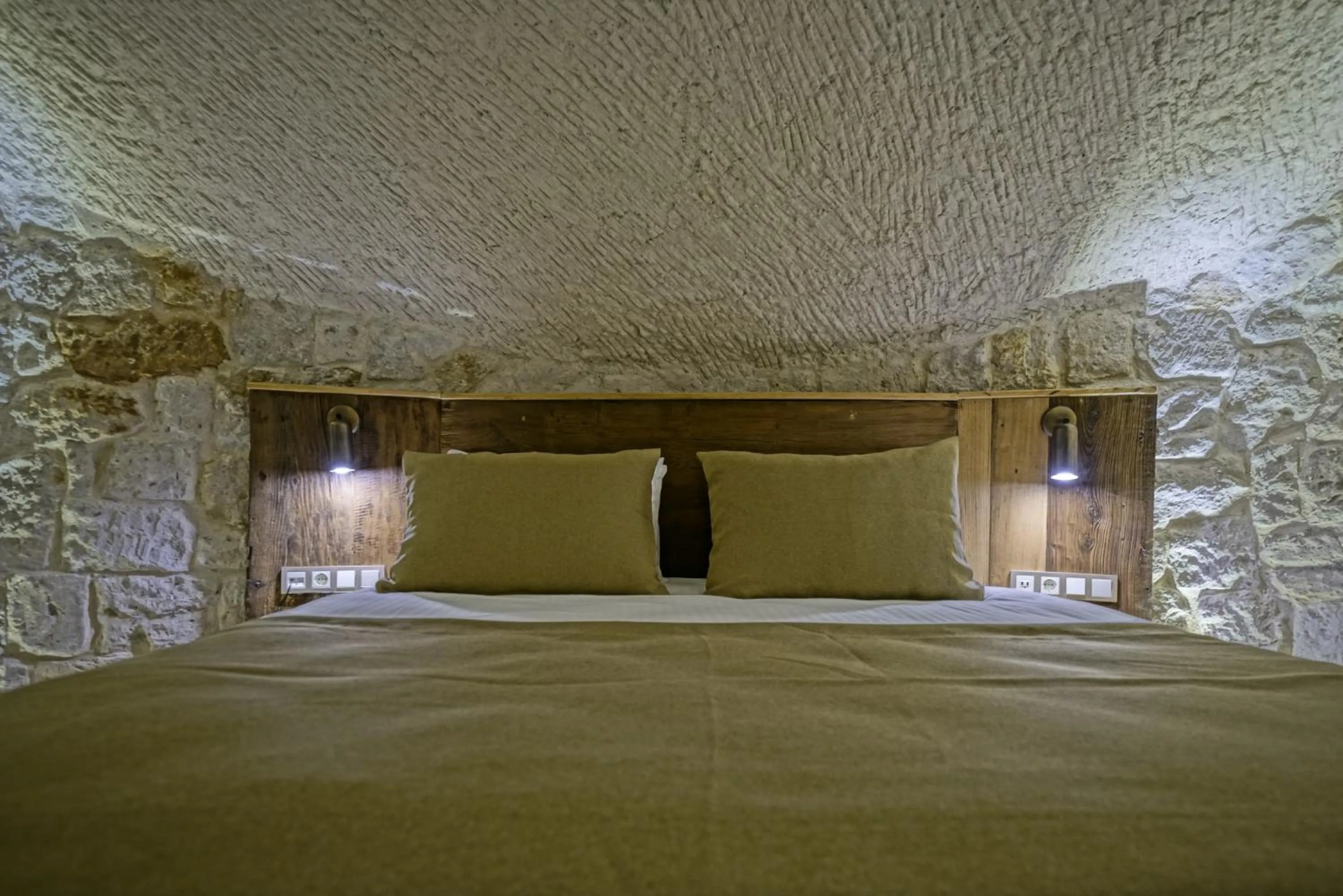 Bed in Kappadoks Cave Hotel