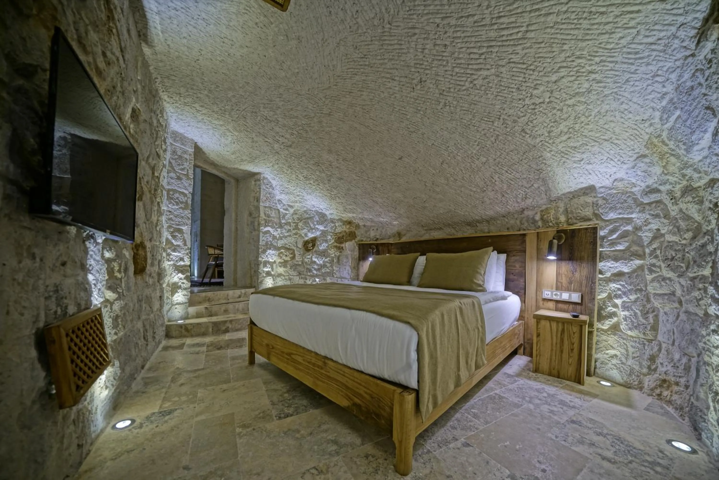 Bed in Kappadoks Cave Hotel