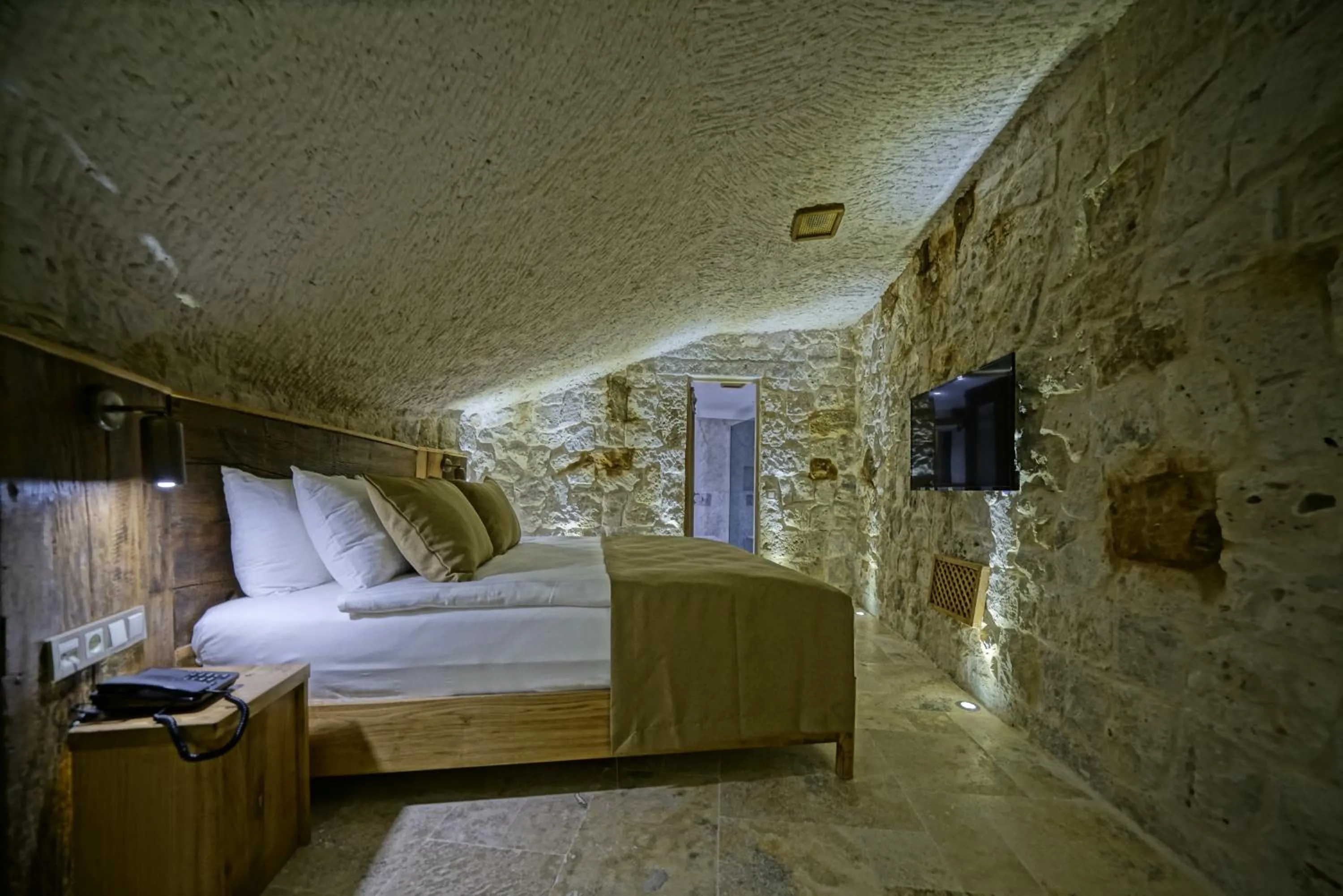 Bed in Kappadoks Cave Hotel