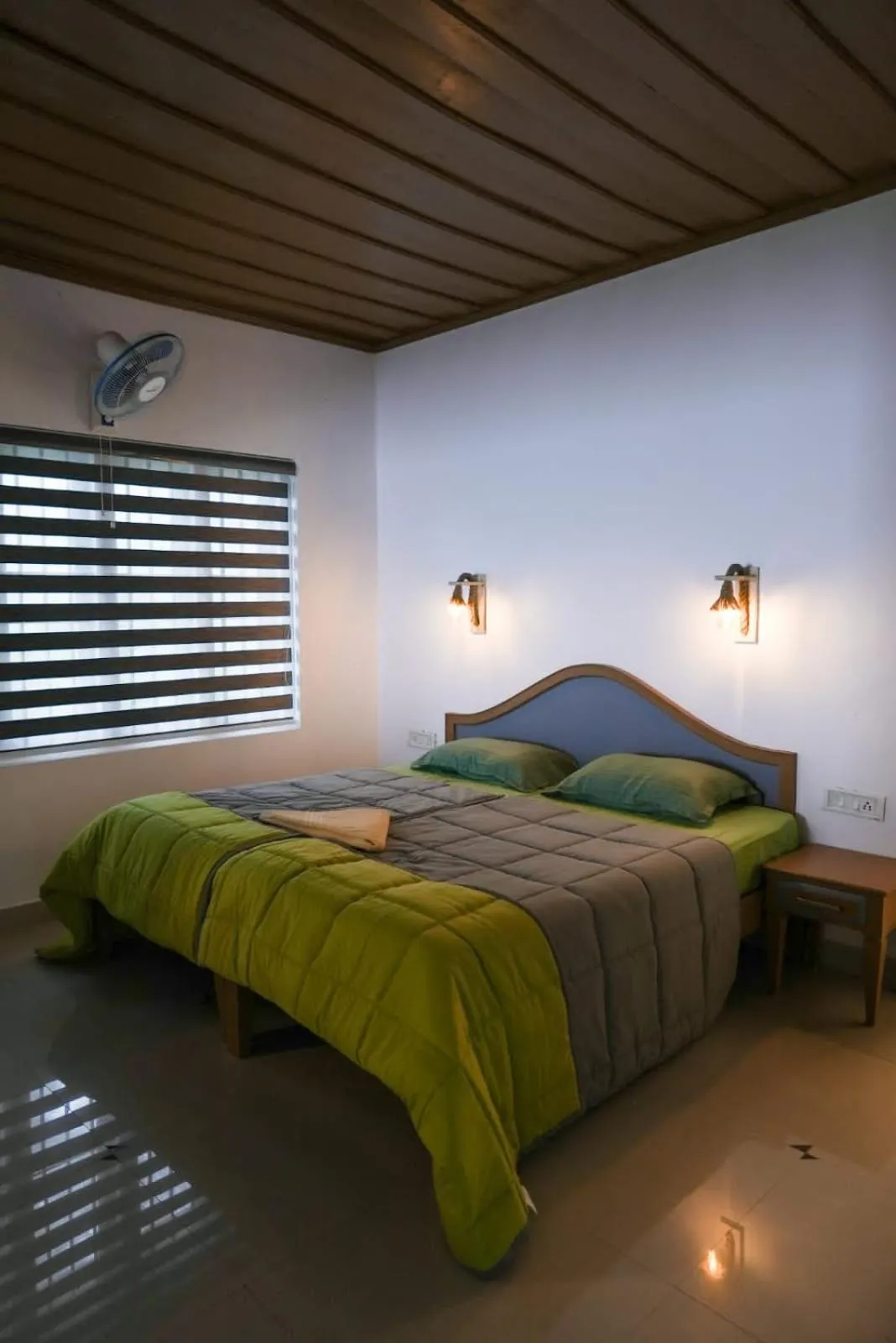 Bed in The Nirvana Resort Munnar
