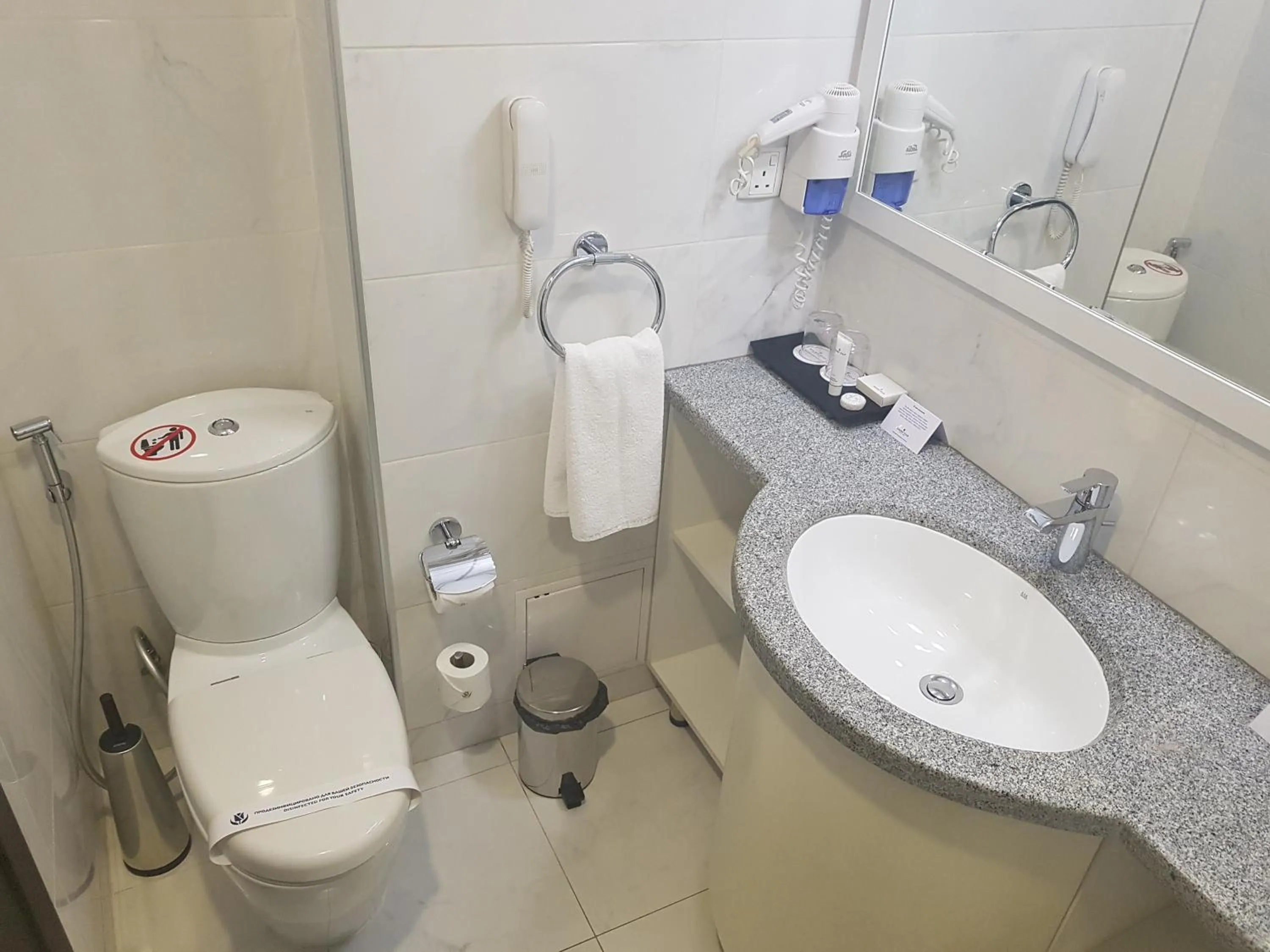 Toilet in Ramada by Wyndham Bishkek Centre