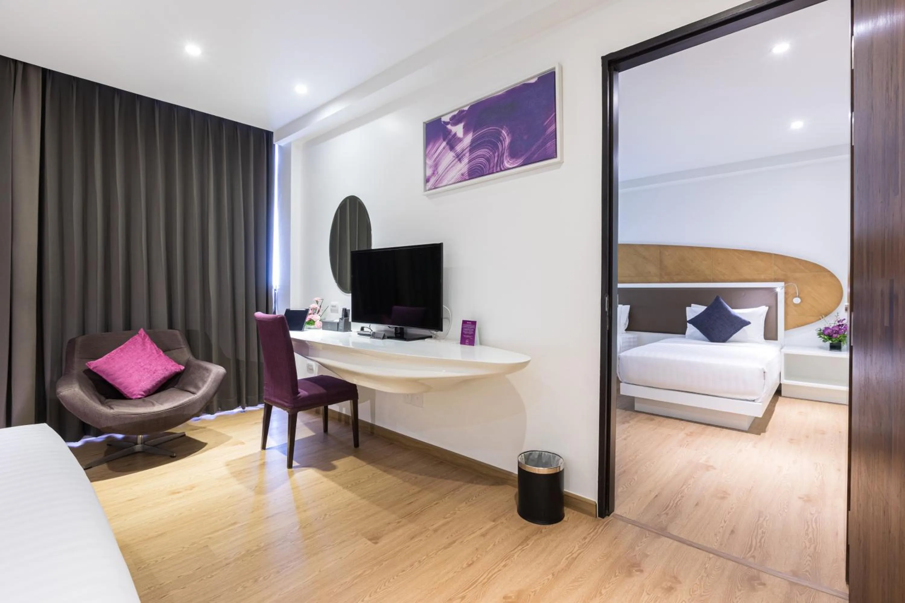 Seating area, Bed in Hotel Icon Bangkok Sukhumvit 2