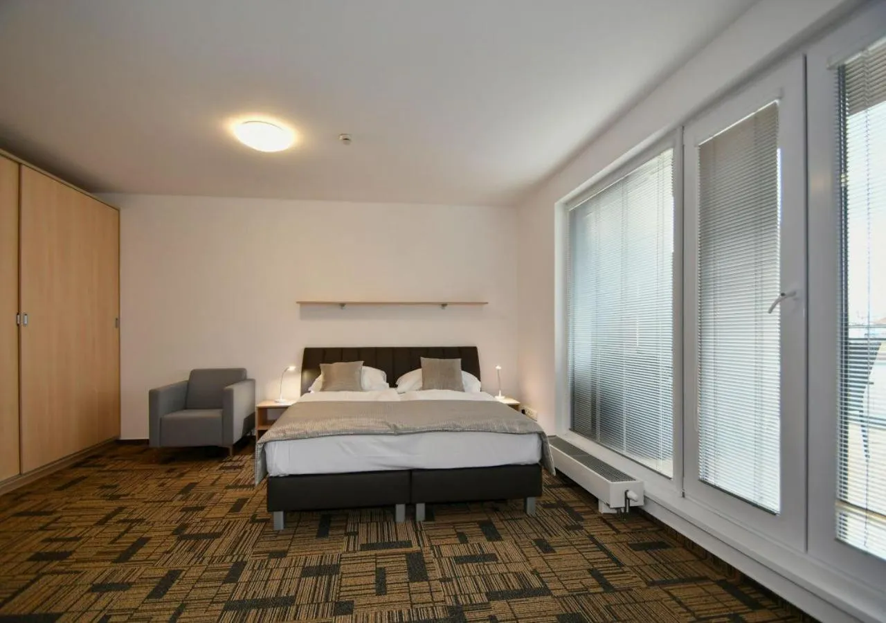 Bed in eFi Palace Hotel