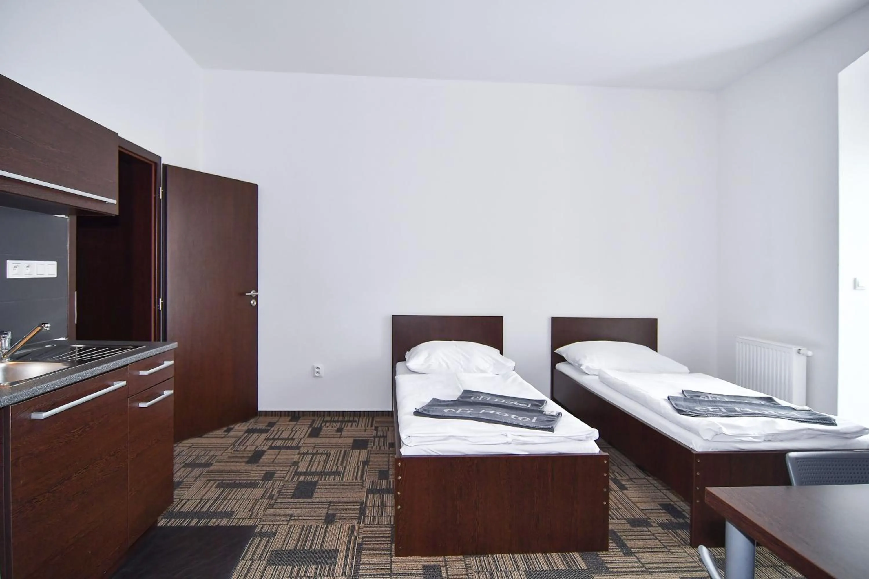 Bed in eFi Palace Hotel