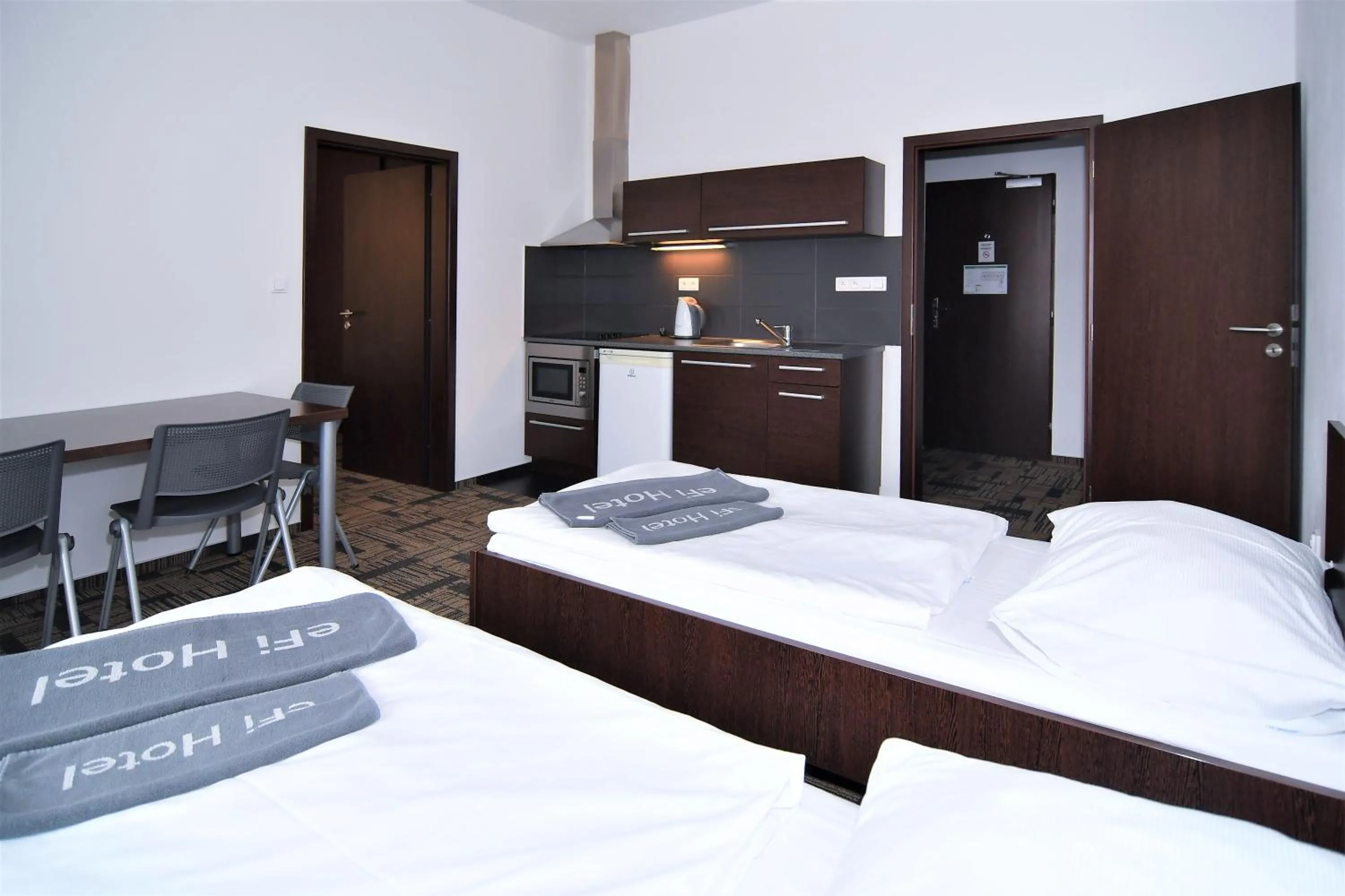 Bed in eFi Palace Hotel