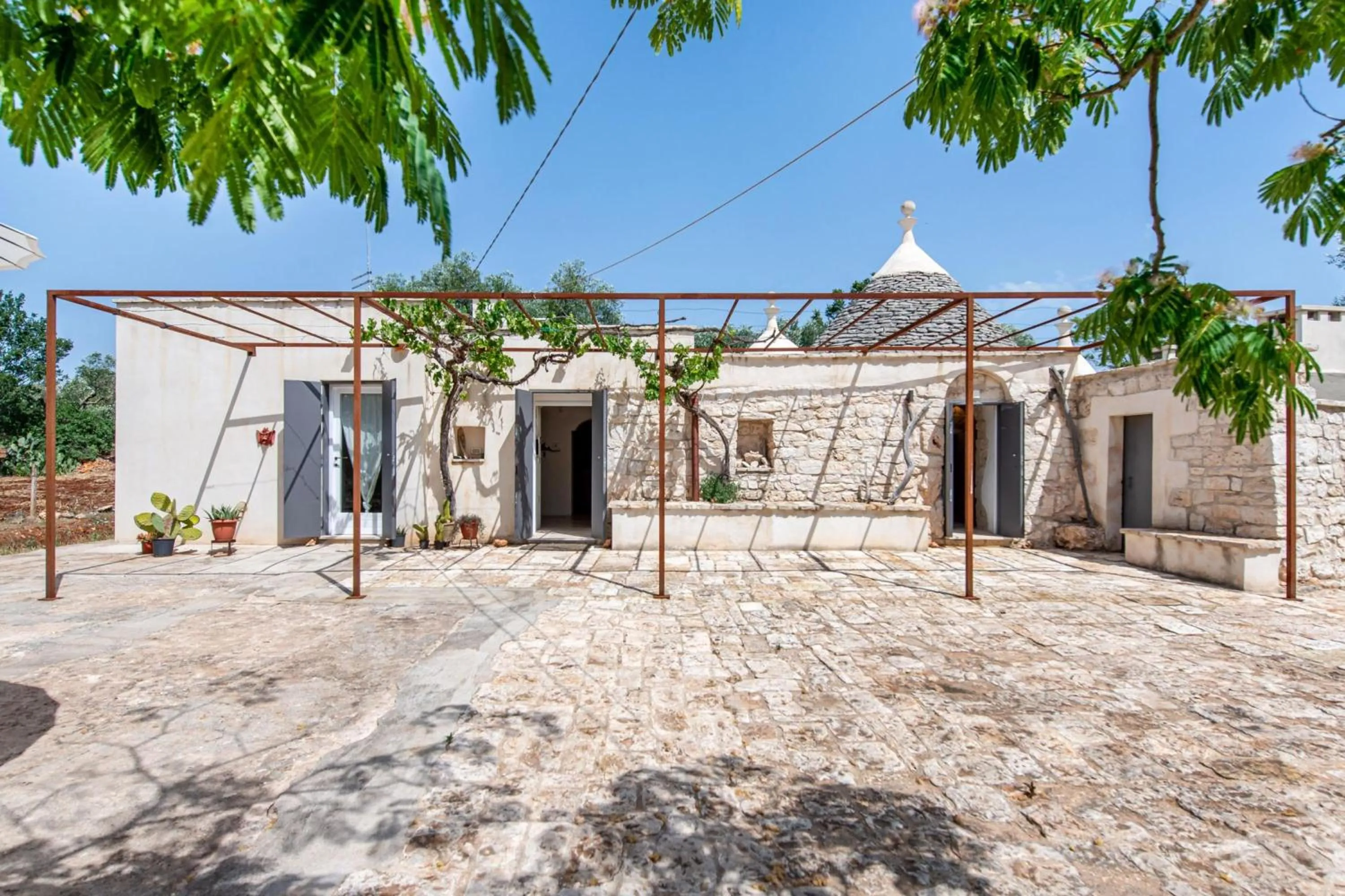 Property building in Trullo Fedele Grande125 - Happy Rentals