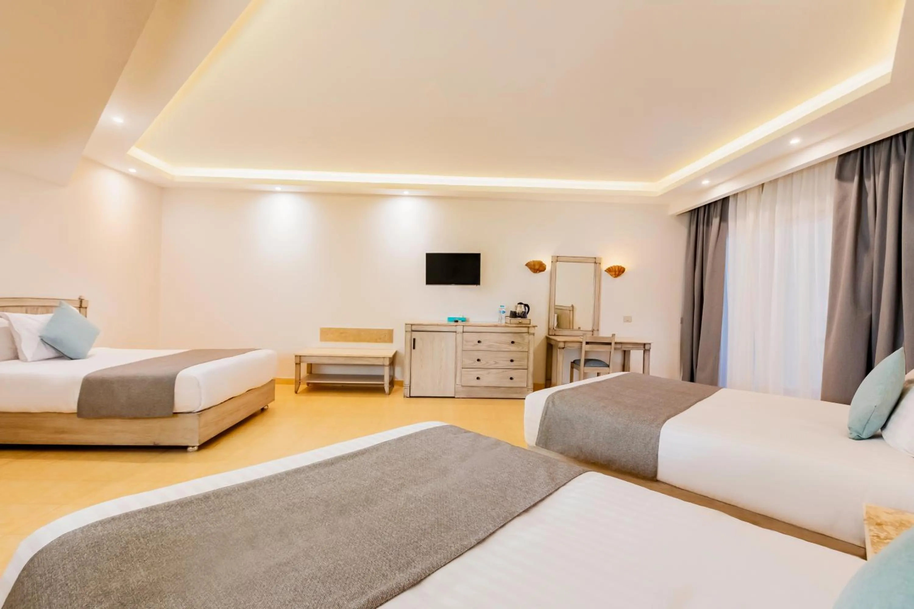 Bed in Sunrise Alma Bay Resort