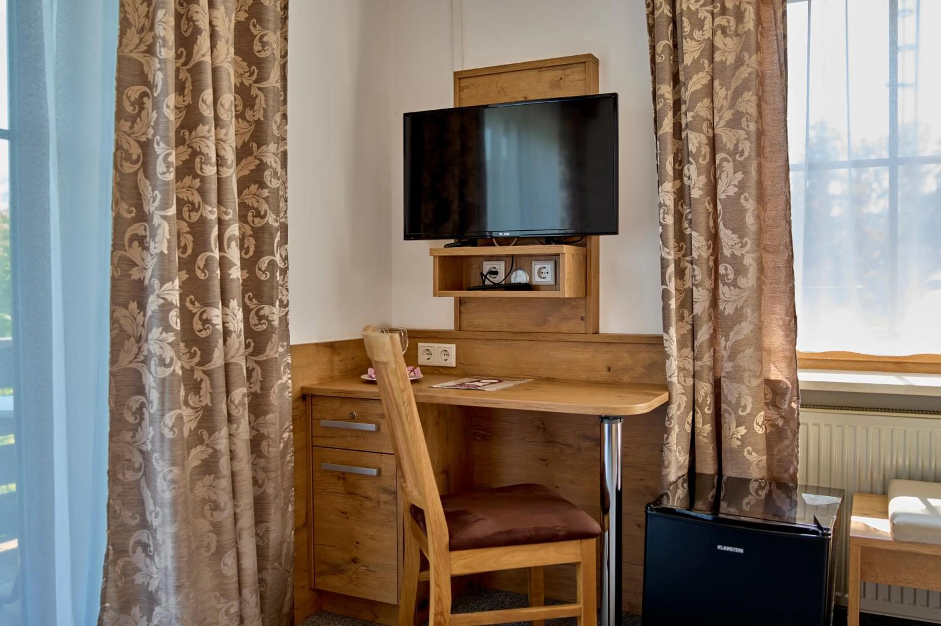 Seating area in Gasthof Pension Fischerstüberl