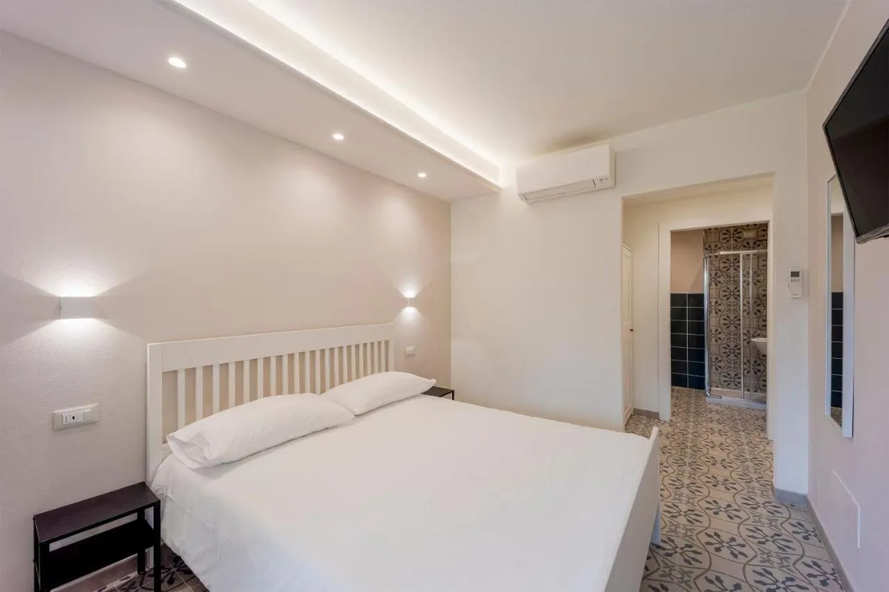 Bed in Gli Ulivi Rooms And Breakfast