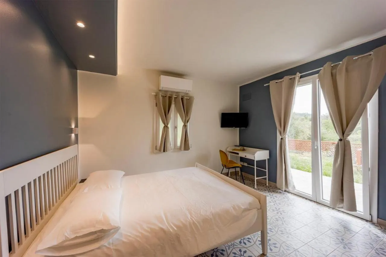 Bed in Gli Ulivi Rooms And Breakfast