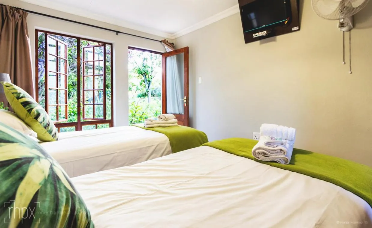 Bedroom, Bed in OR Tambo Guest House