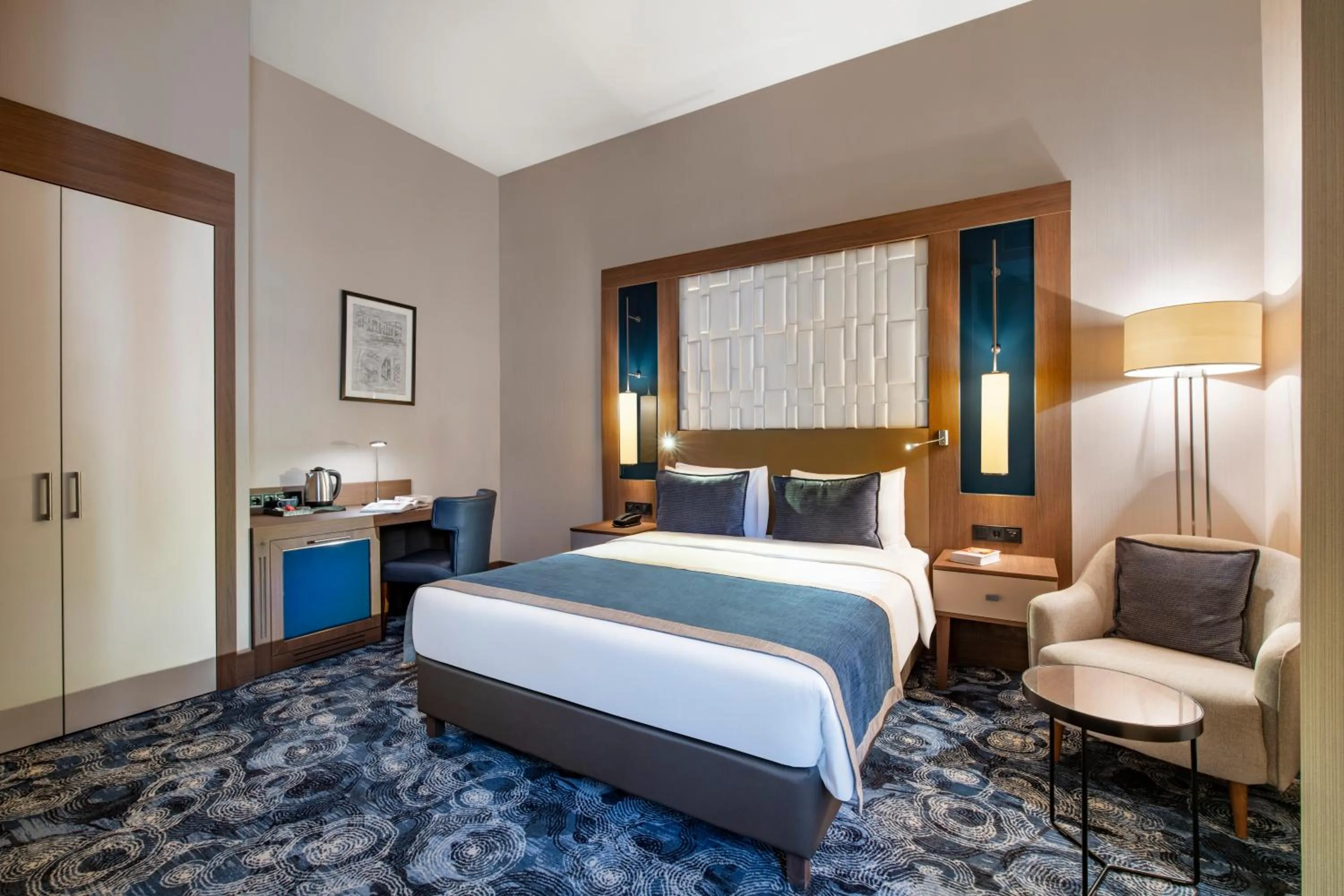 Bed in Tbilisi Philharmonic Hotel by Mercure