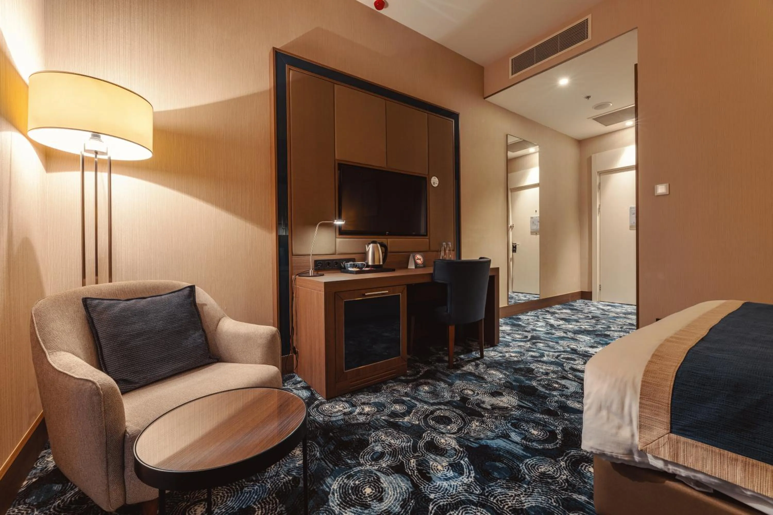 Bed in Tbilisi Philharmonic Hotel by Mercure