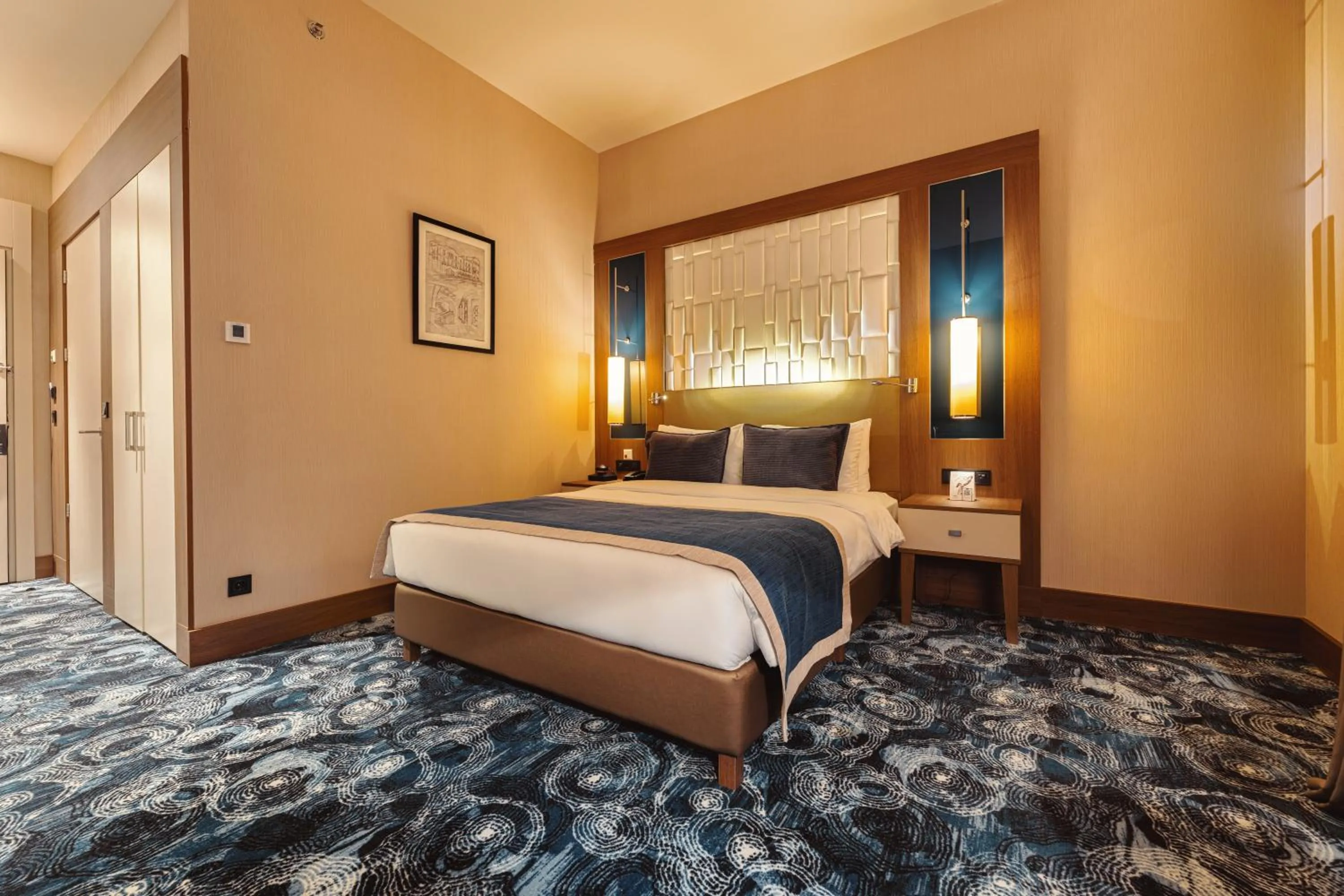 Bed in Tbilisi Philharmonic Hotel by Mercure