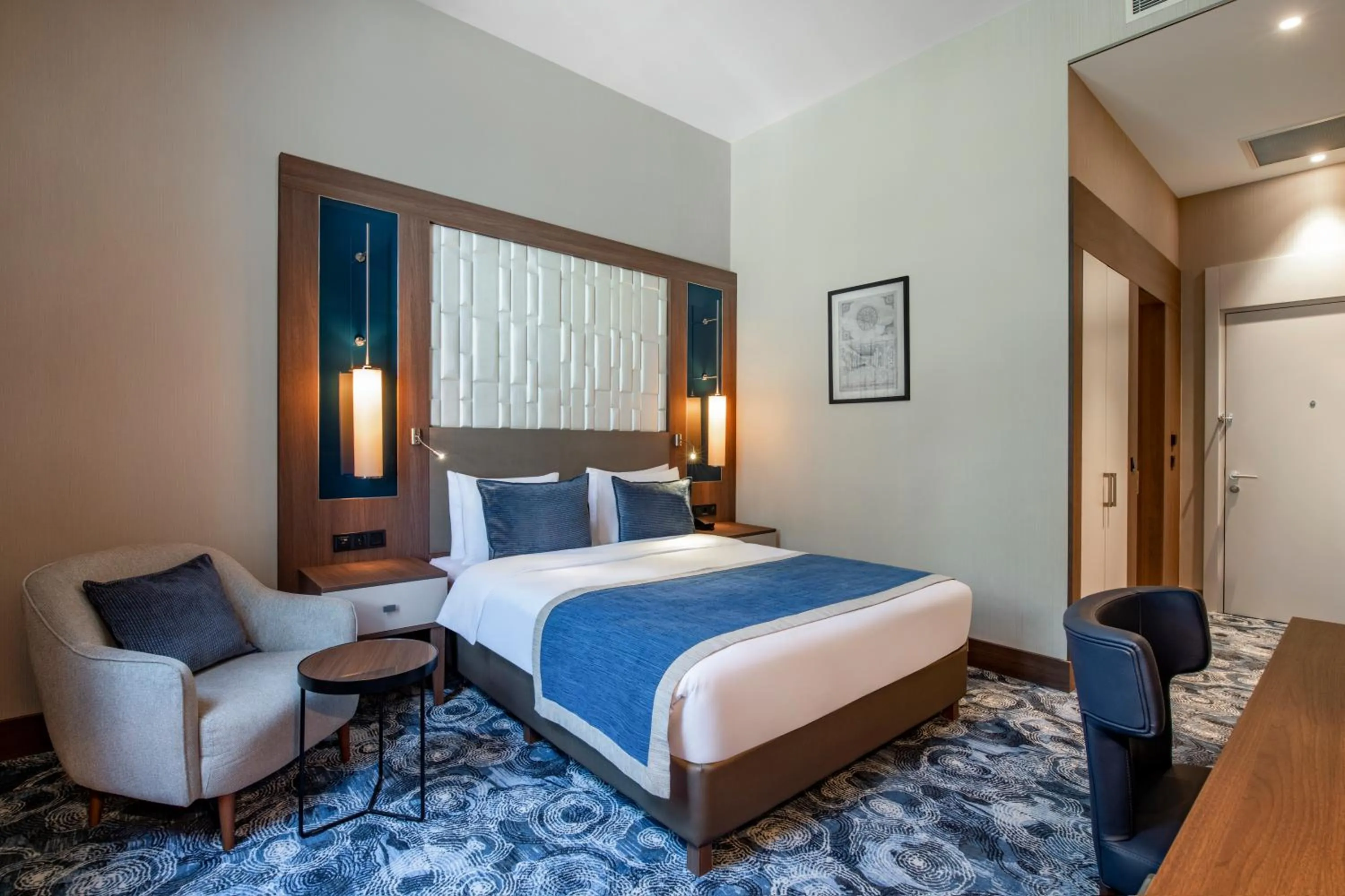 Bed in Tbilisi Philharmonic Hotel by Mercure