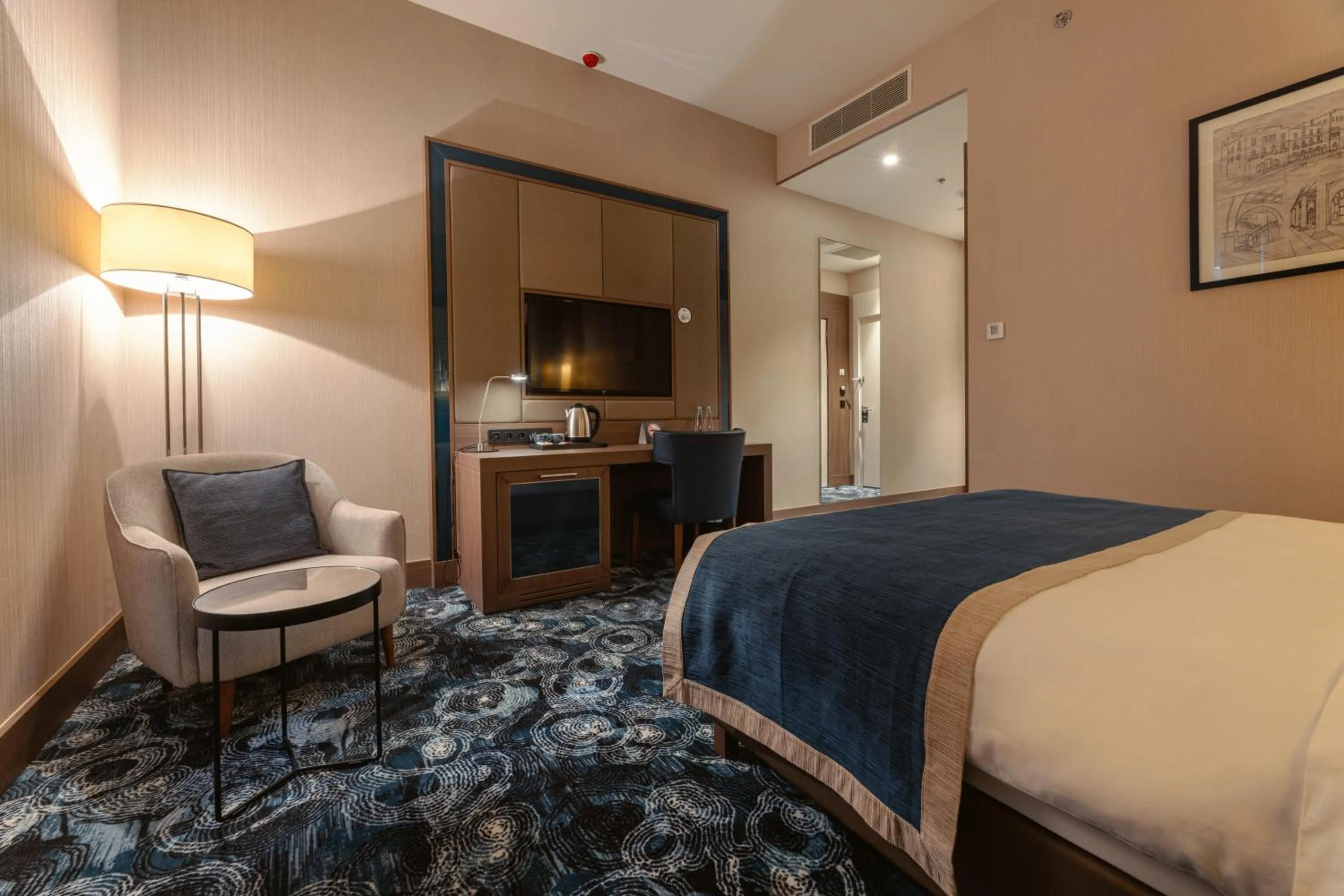 Bed in Tbilisi Philharmonic Hotel by Mercure