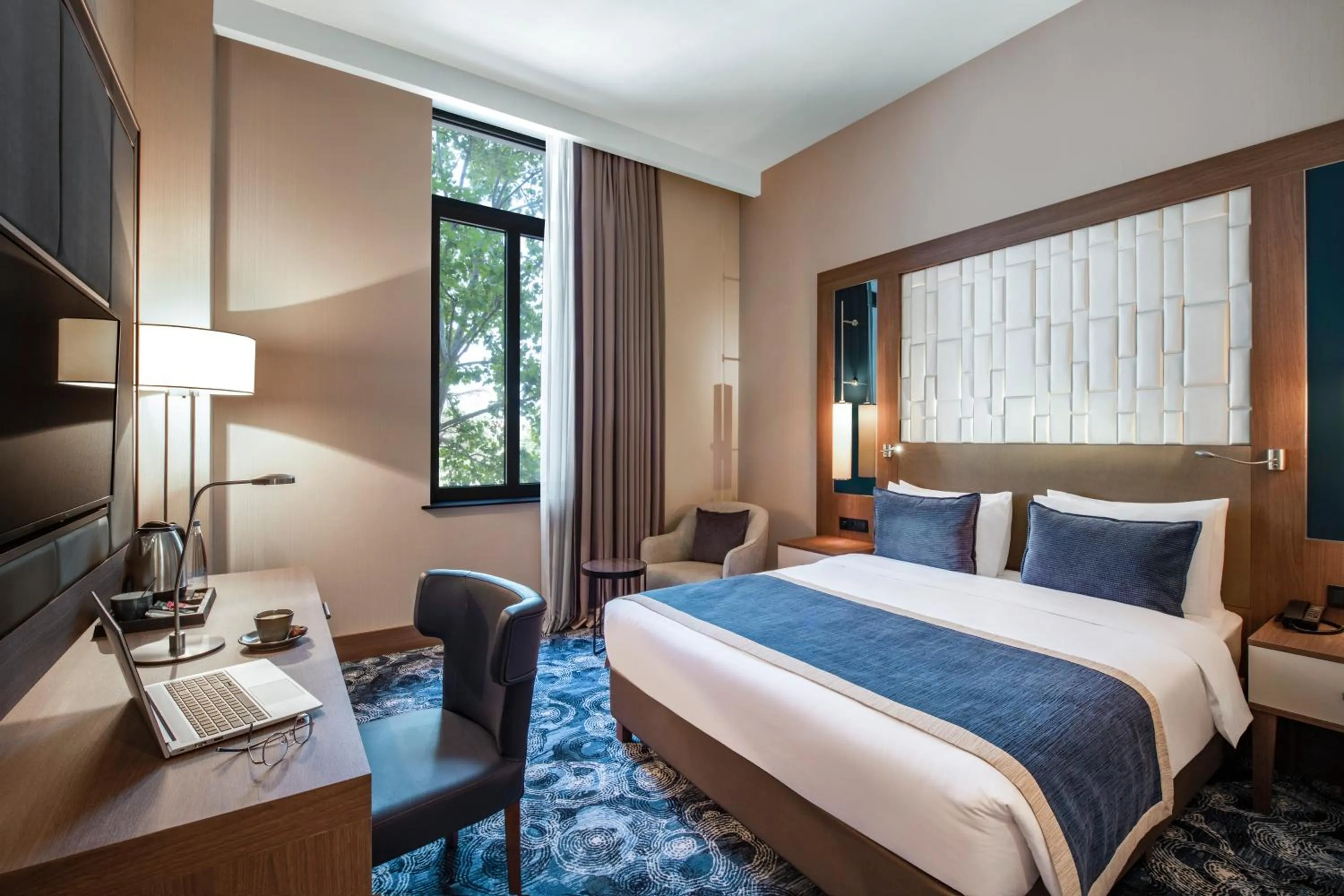 Bed in Tbilisi Philharmonic Hotel by Mercure