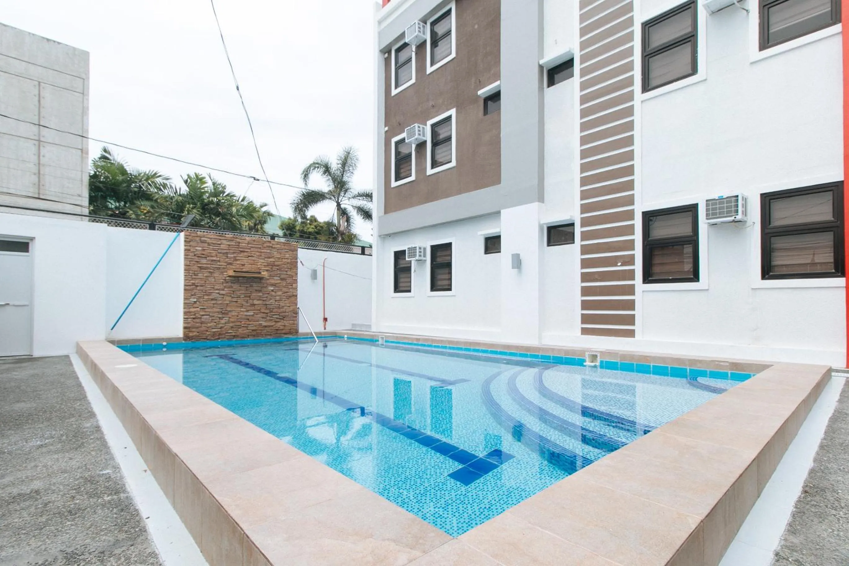 Swimming pool in RedDoorz Plus at DBuilders Poblacion BGC
