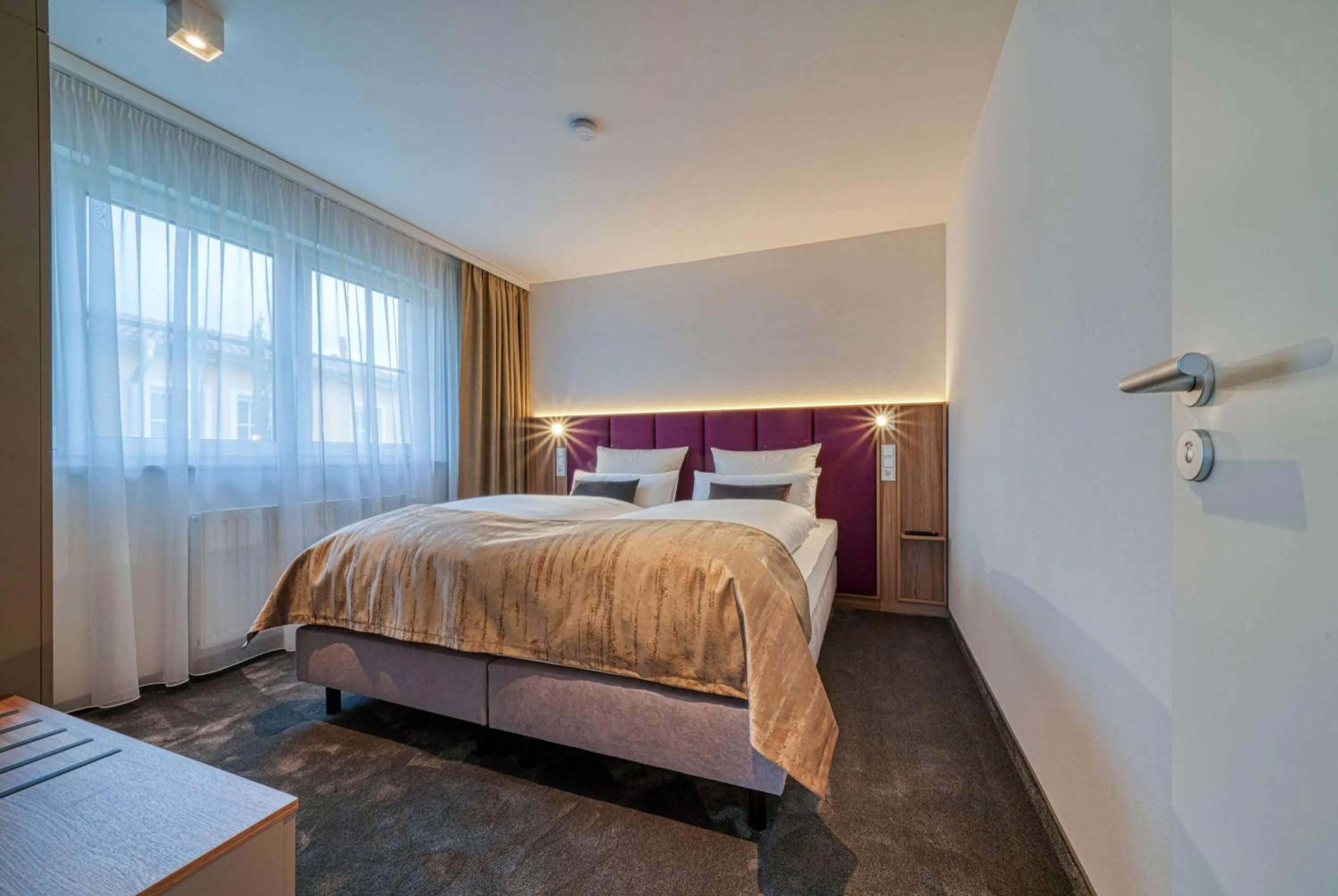 Photo of the whole room, Bed in FourSide Hotel Ringsheim, Trademark Collection by Wyndham